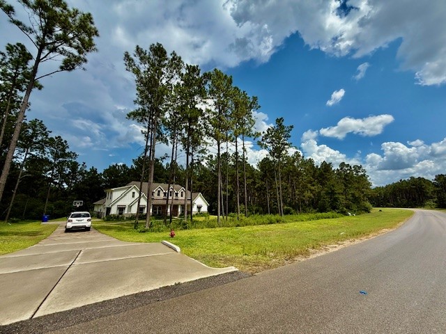 10790 Ruger Road Willis, TX 77378 - Photo 11 of 18 a view of a playground with basketball court