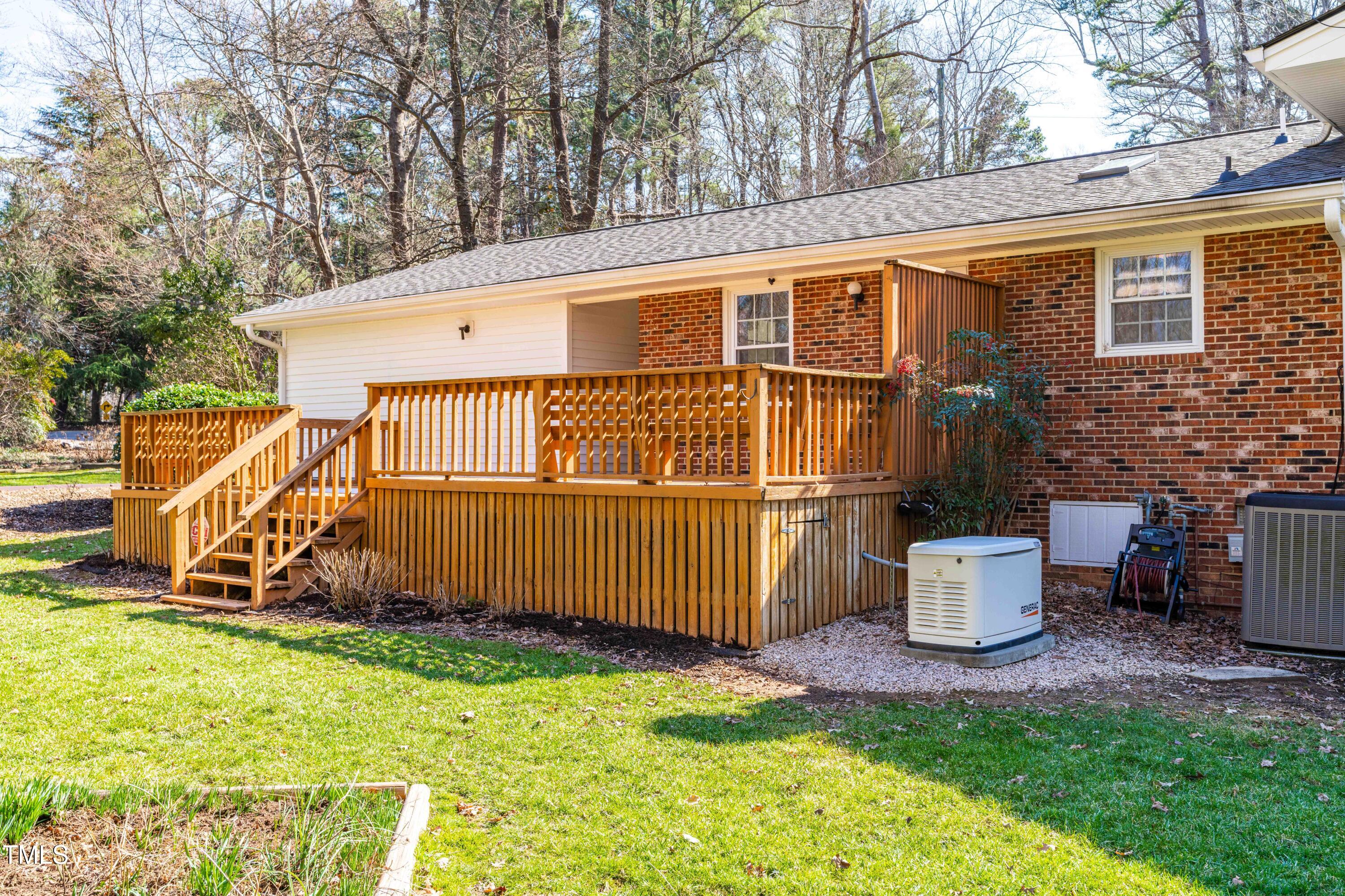 6500 Brandywine Road Raleigh, NC 27607 - Photo 24 of 41 a view of a backyard with plants