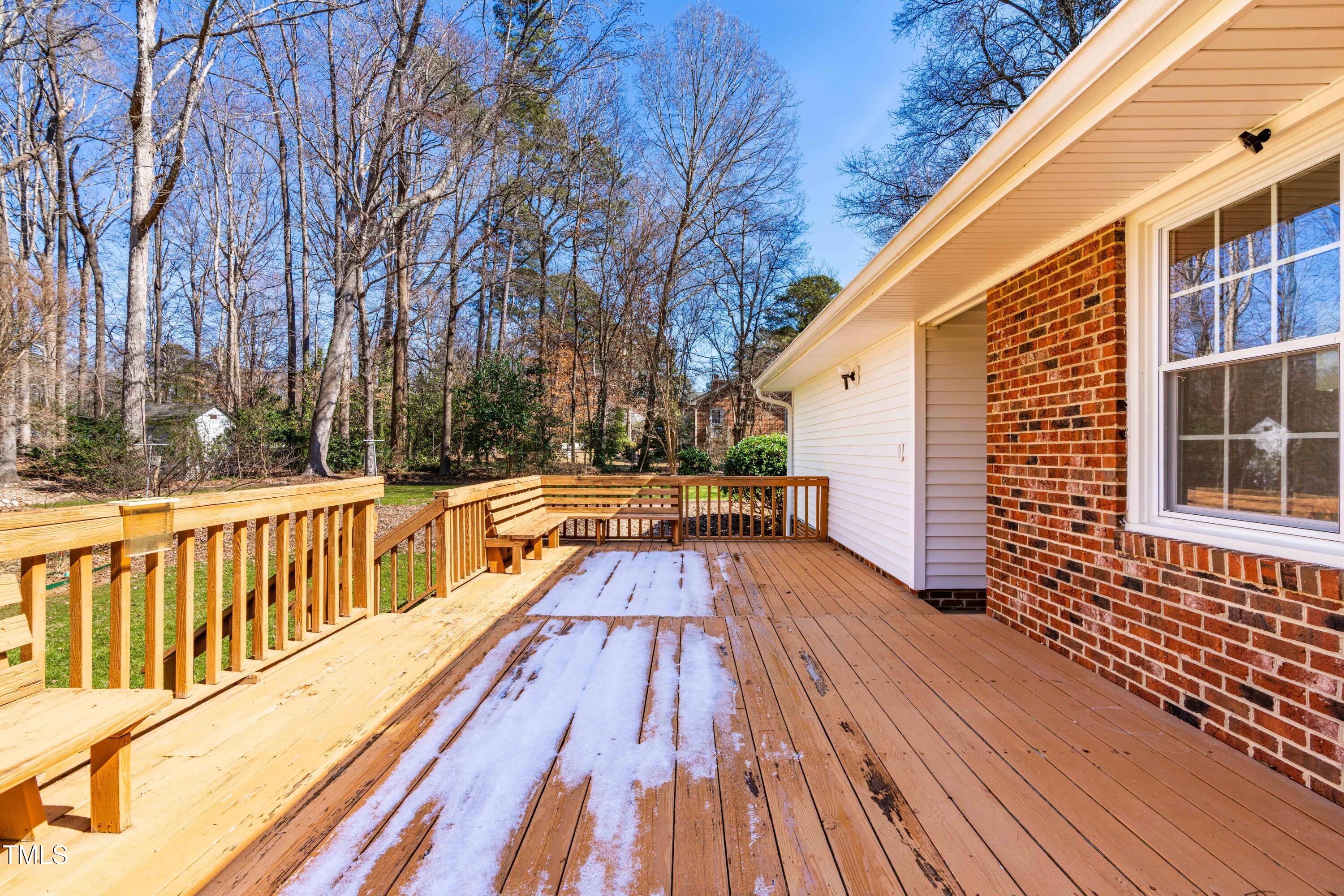 6500 Brandywine Road Raleigh, NC 27607 - Photo 26 of 41 a view of balcony with wooden floor and fence