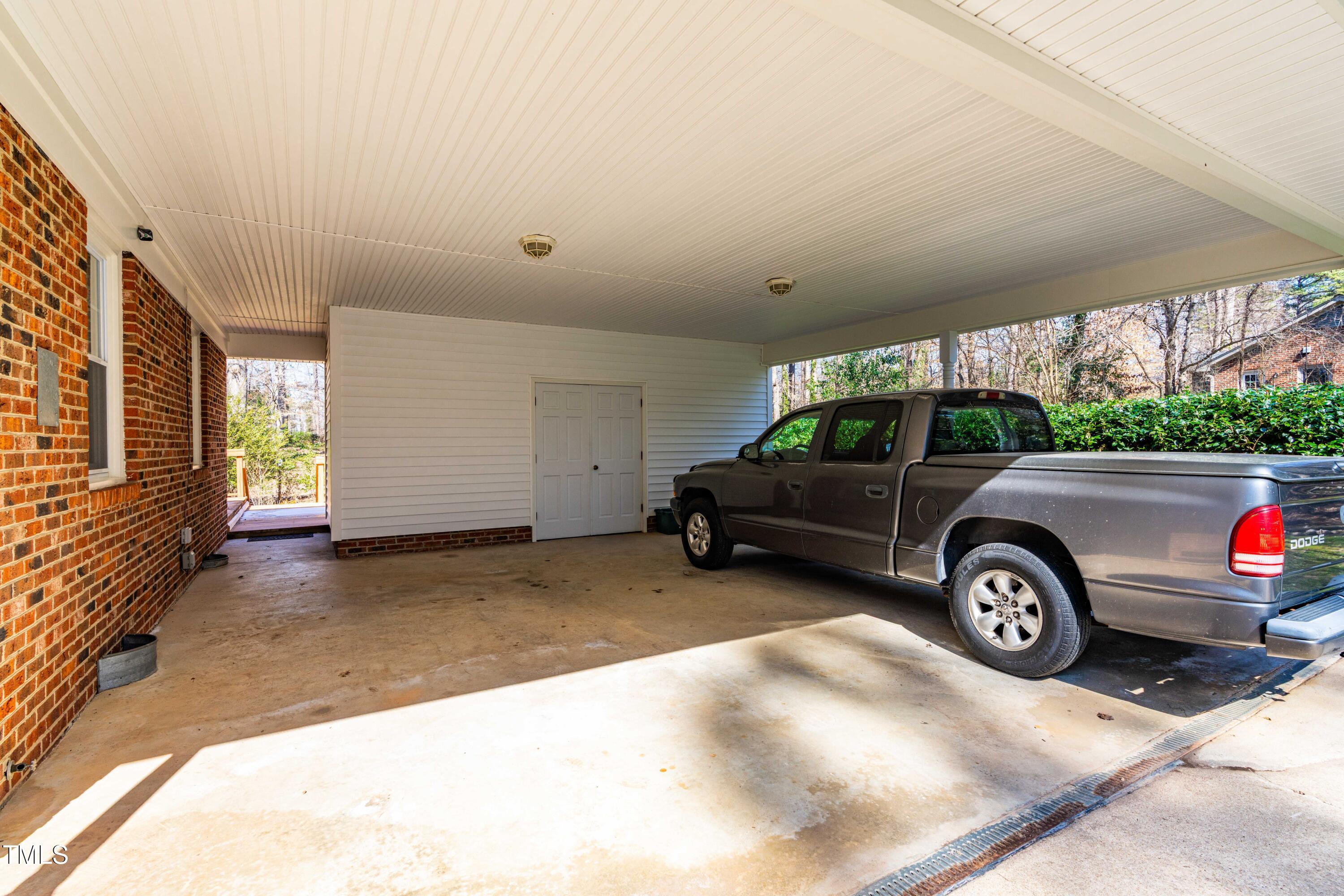 6500 Brandywine Road Raleigh, NC 27607 - Photo 28 of 41 a front view of a house with parking space