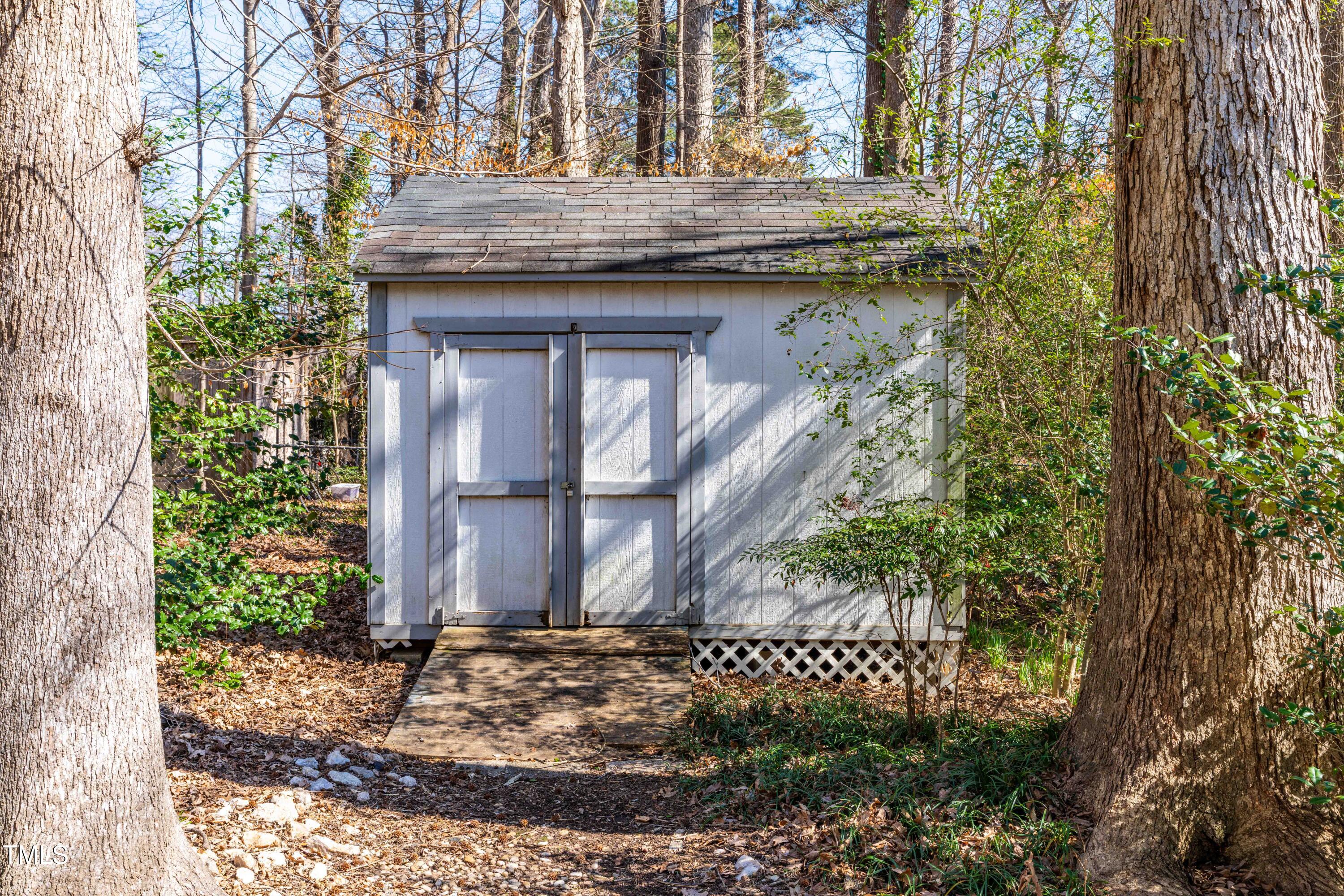 6500 Brandywine Road Raleigh, NC 27607 - Photo 32 of 41 a view of a house with a tree