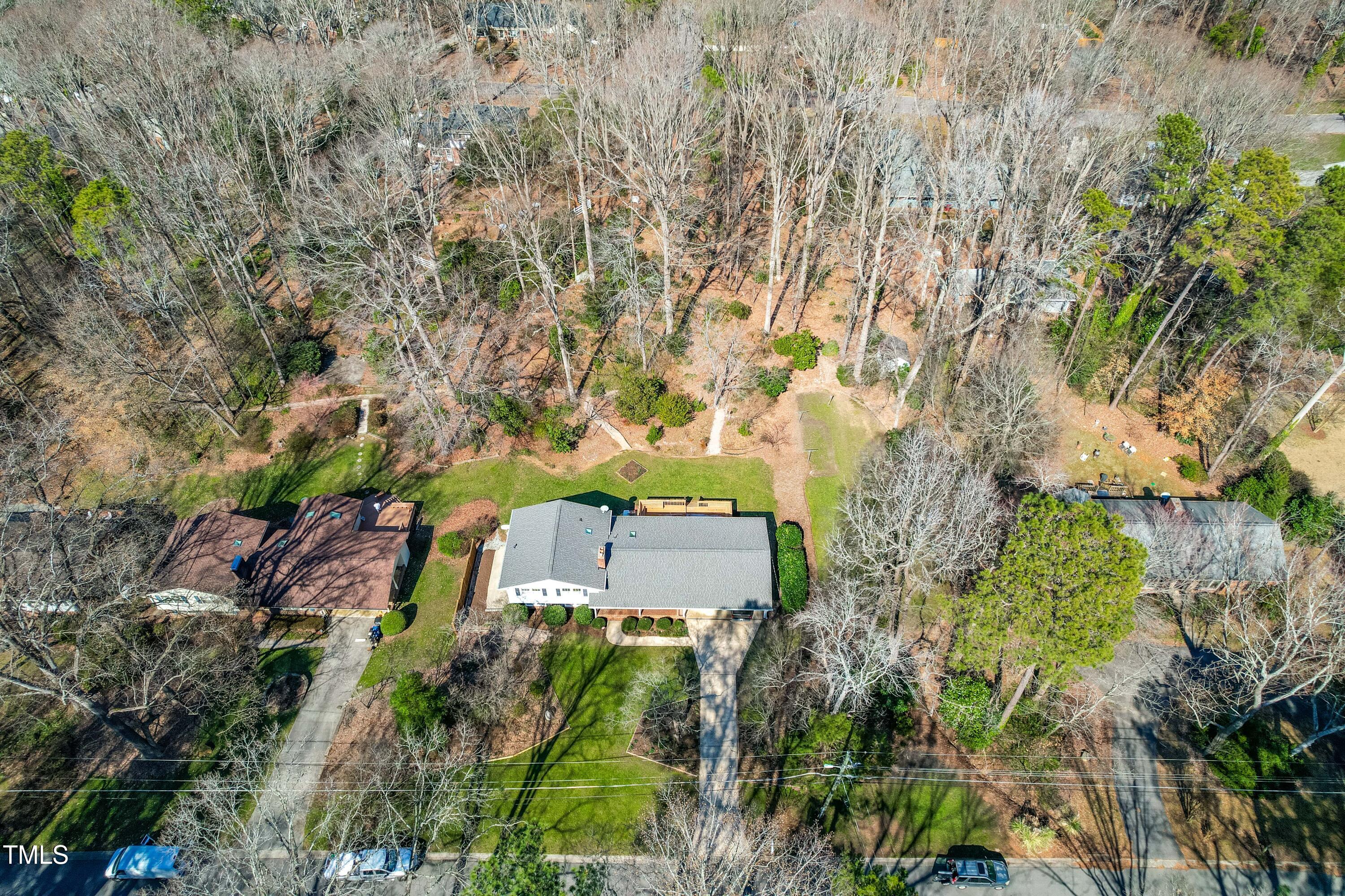 6500 Brandywine Road Raleigh, NC 27607 - Photo 3 of 41 an aerial view of a house with yard and outdoor space