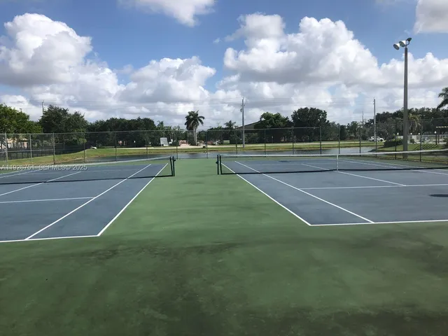 a view of outdoor space and tennis court