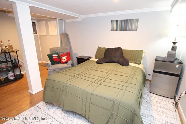 a bed room with a bed and a couch