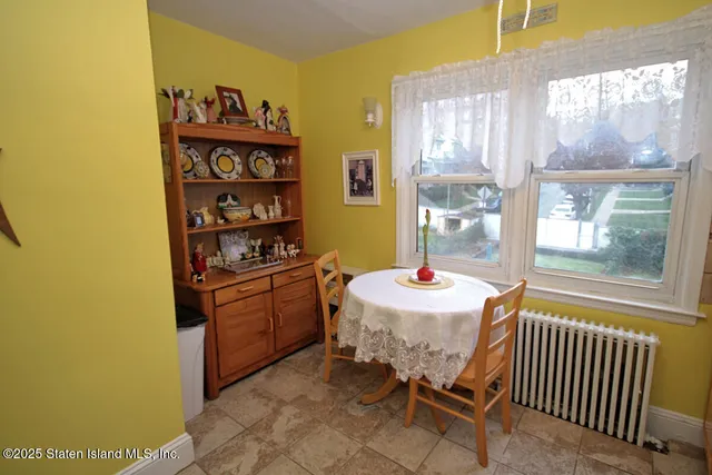a kitchen that has a lot of cabinets in it