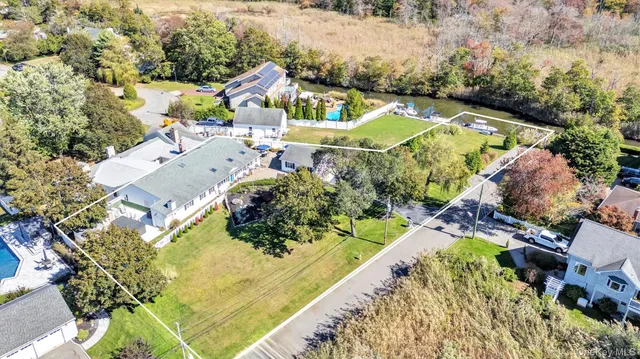 a view of a chairs and table in the patio