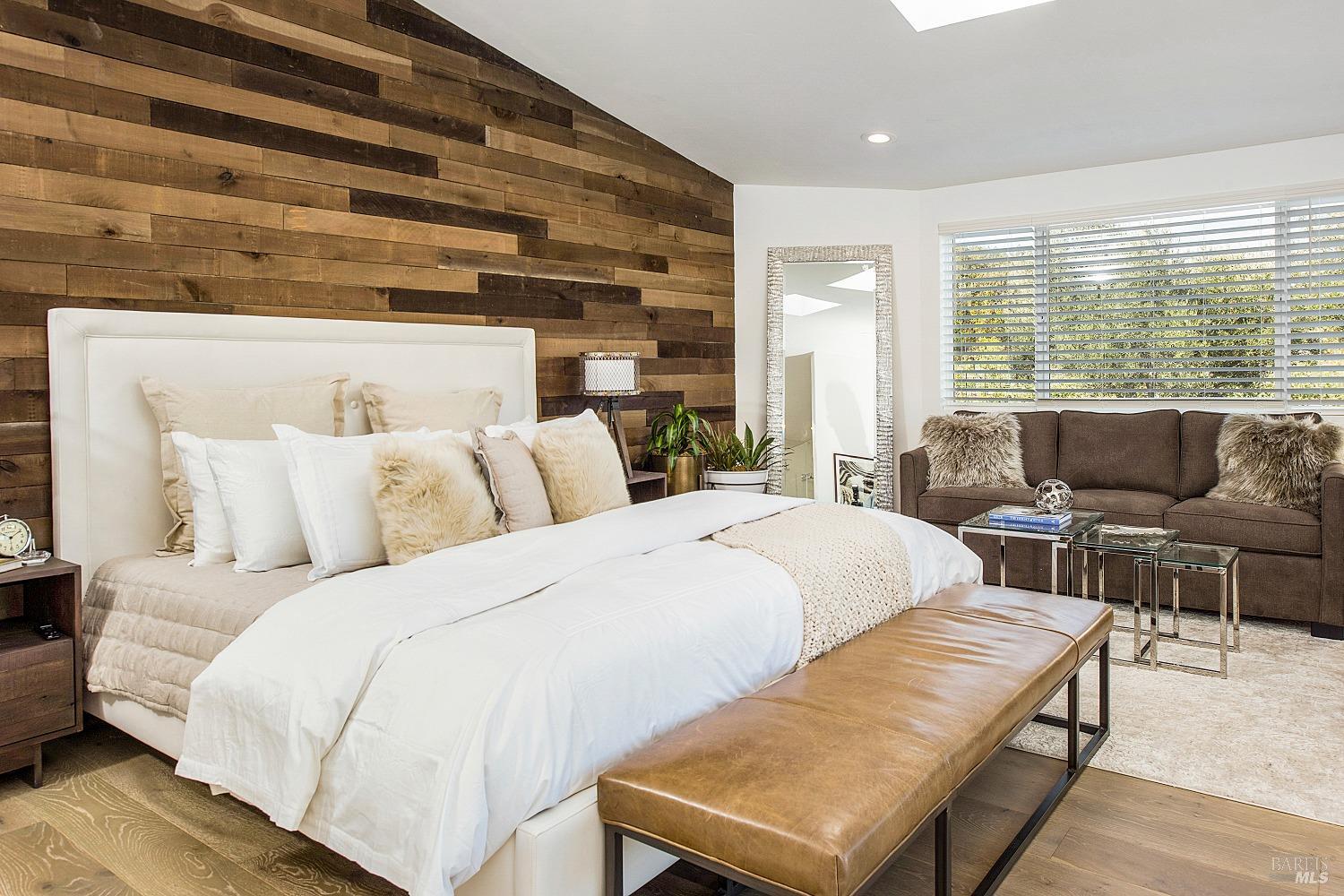 3002 Foothill Boulevard Calistoga, CA 94515 - Photo 23 of 60 a bedroom with bed and a large window