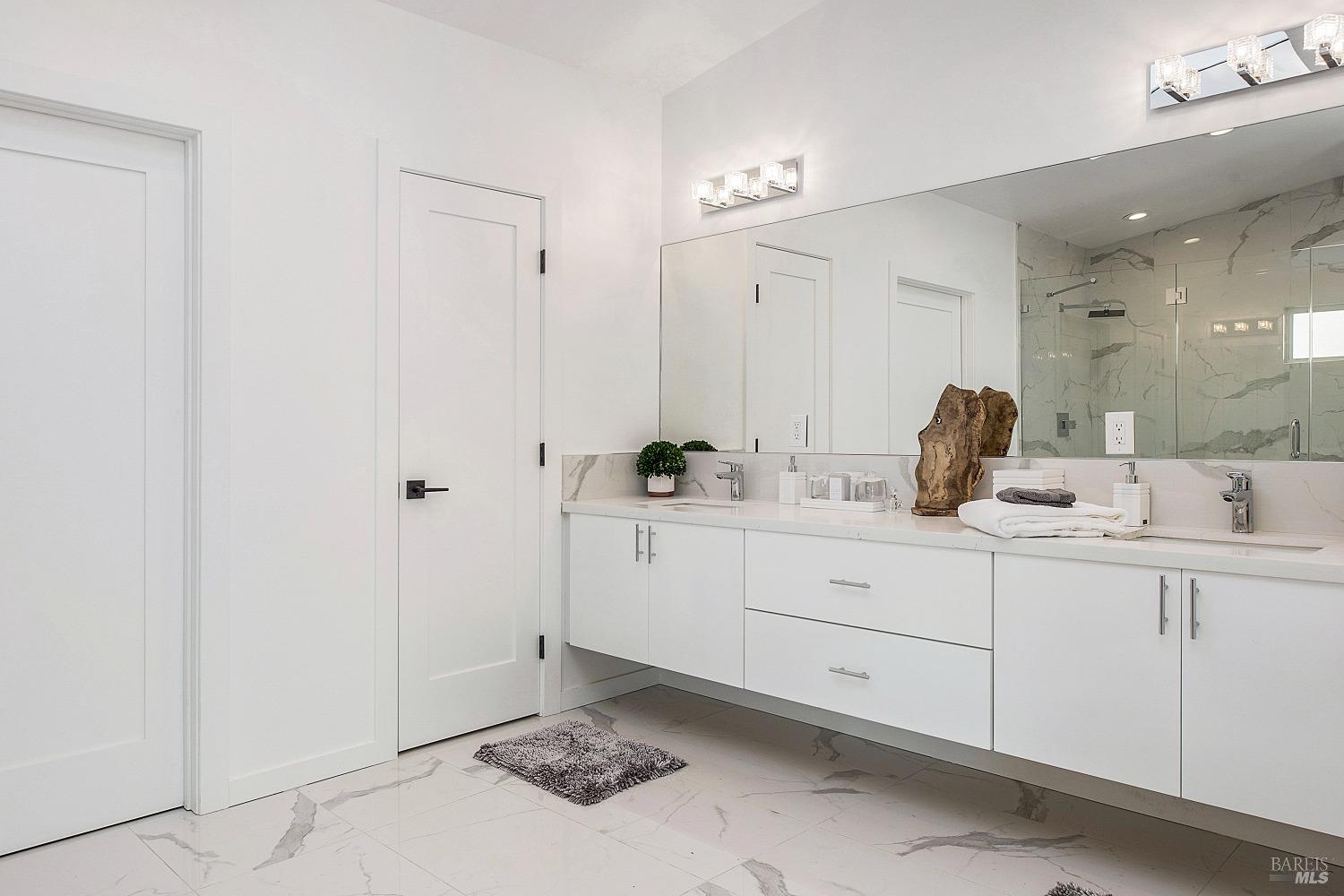 3002 Foothill Boulevard Calistoga, CA 94515 - Photo 26 of 60 a bathroom with a sink and a mirror