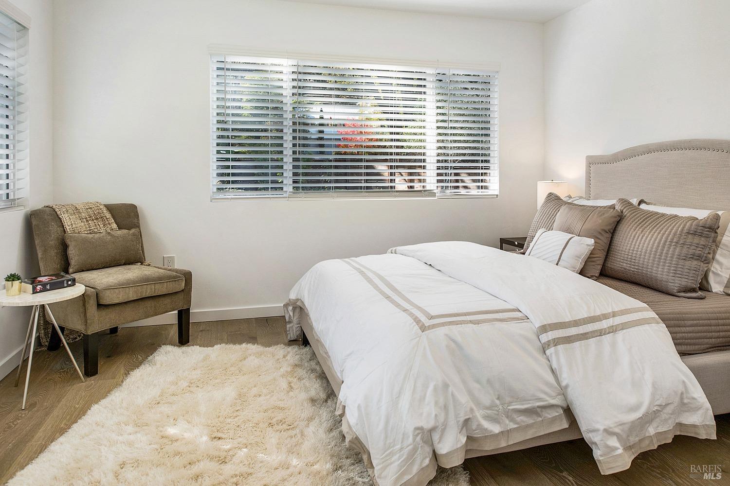 3002 Foothill Boulevard Calistoga, CA 94515 - Photo 28 of 60 a bedroom with bed and a window