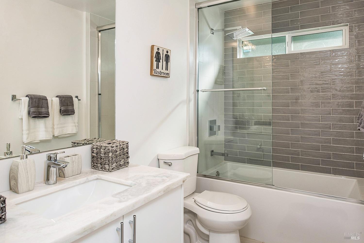 3002 Foothill Boulevard Calistoga, CA 94515 - Photo 30 of 60 a bathroom with a sink toilet and shower