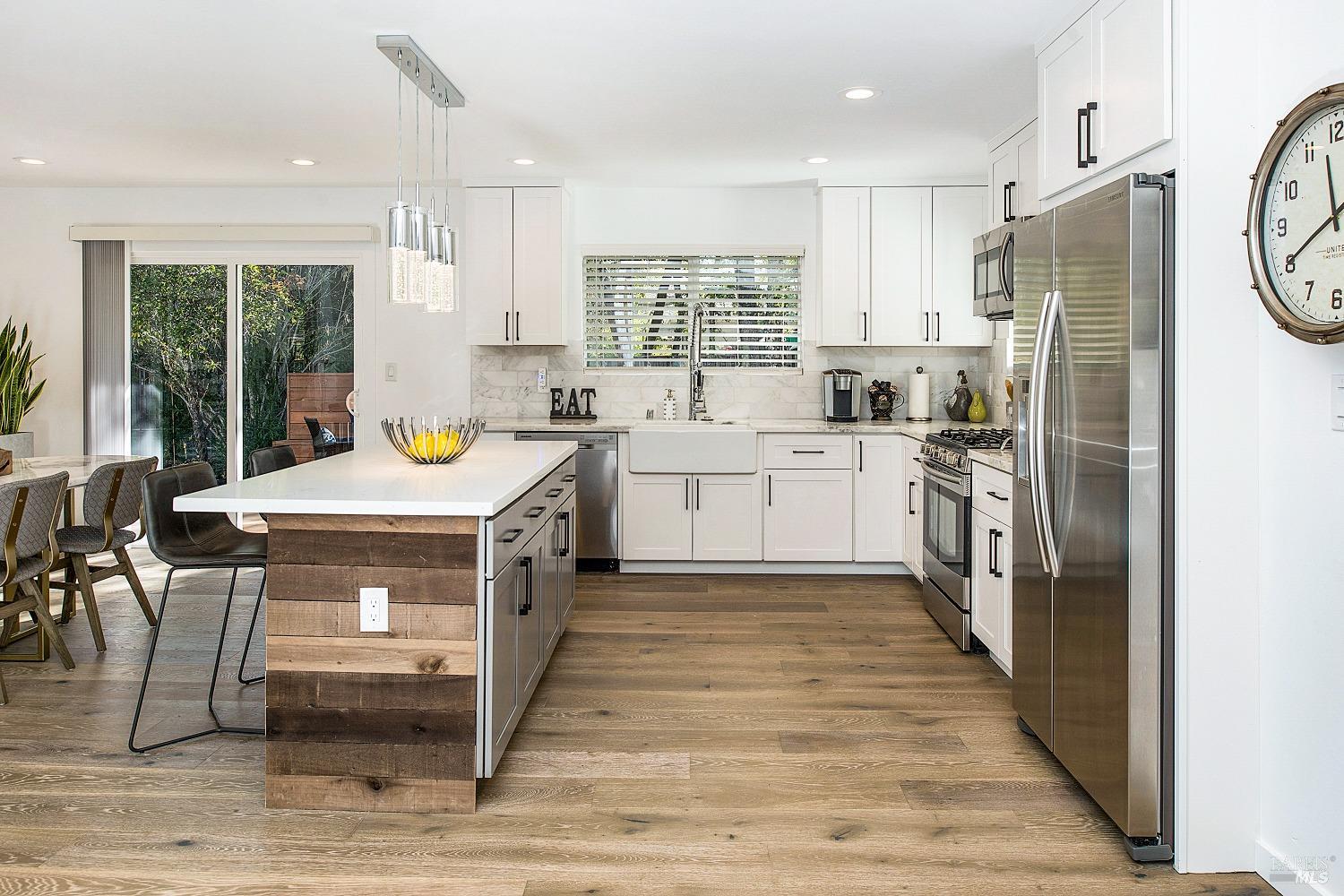 3002 Foothill Boulevard Calistoga, CA 94515 - Photo 7 of 60 a kitchen with a stove a refrigerator and a sink