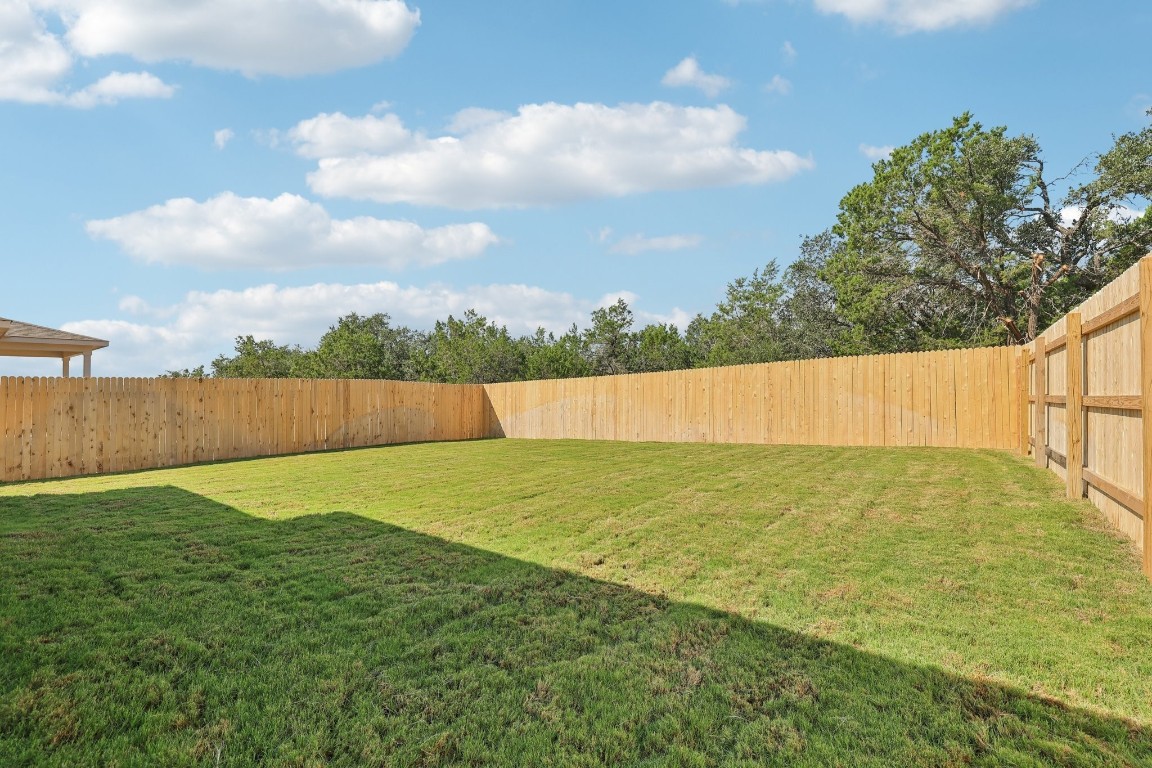 1212 Lavender Way Georgetown, TX 78628 - Photo 20 of 32 a view of a backyard