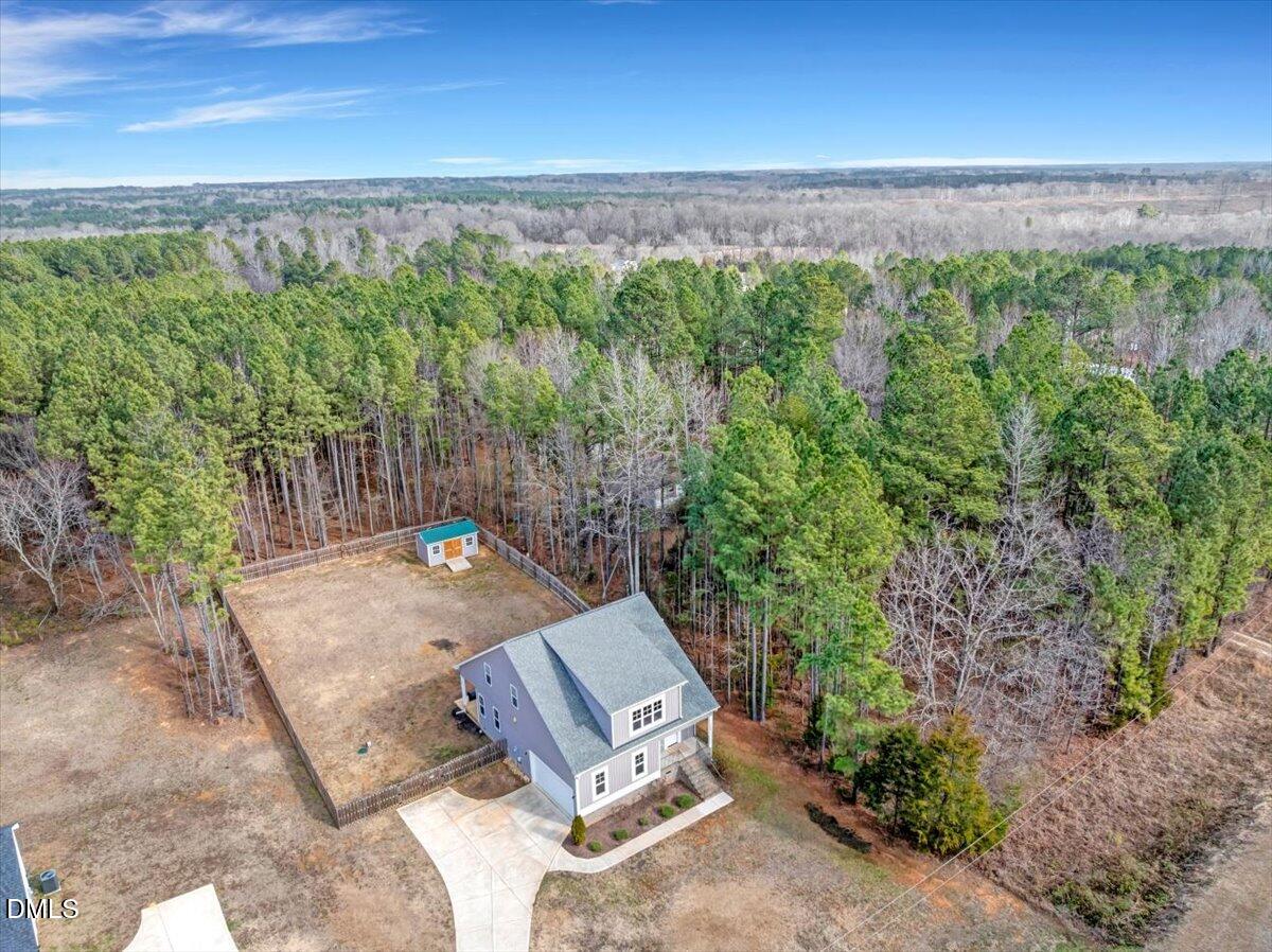 1208 Montgomery Road Franklinton, NC 27525 - Photo 39 of 61 a view of a yard with an outdoor seating