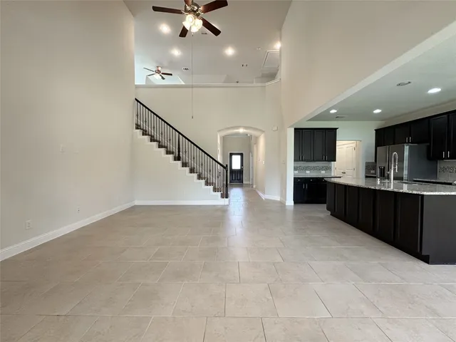 a view of a kitchen with a sink and a microwave