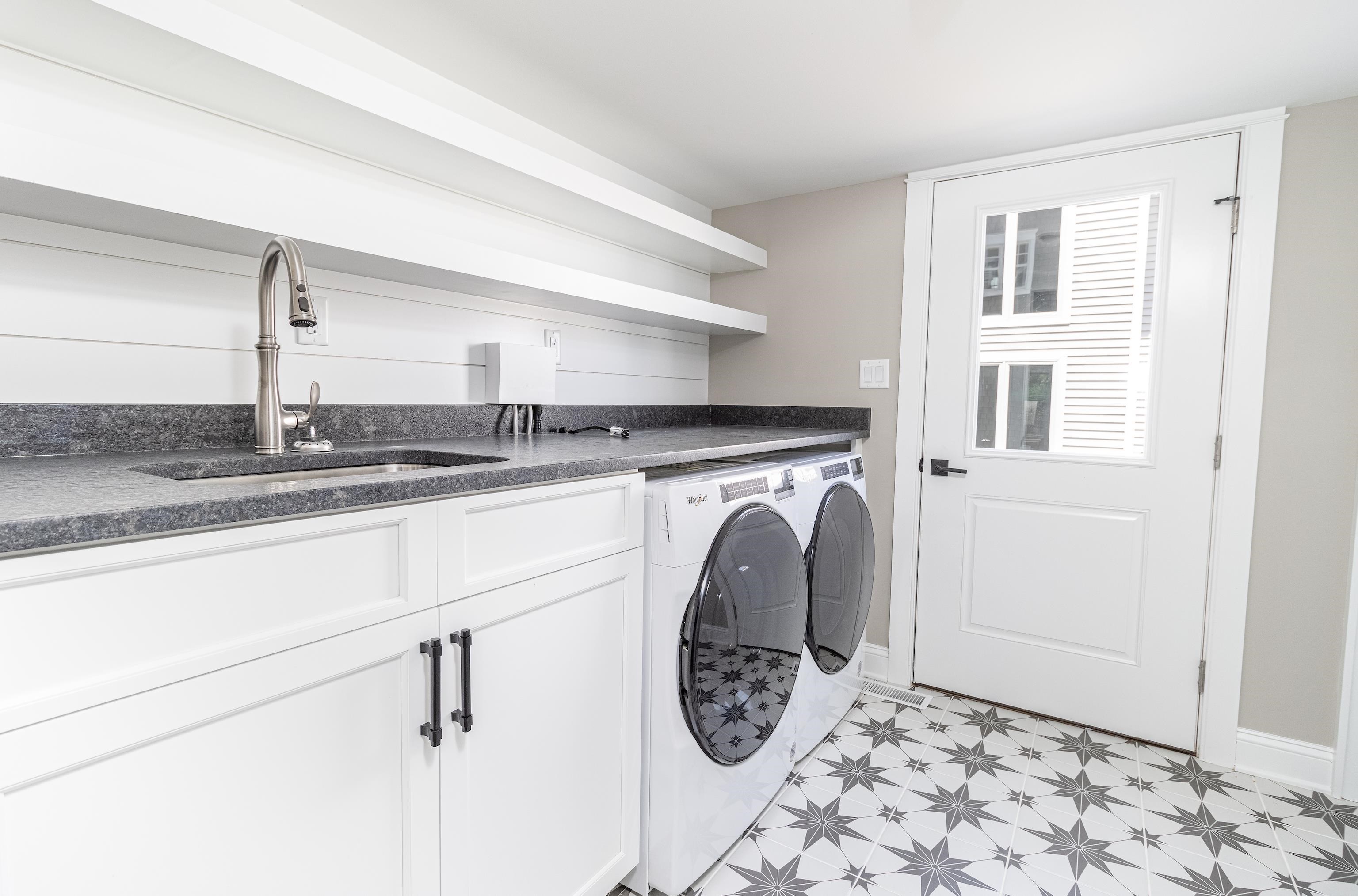 121 32nd Street Avalon, NJ 08202 - Photo 12 of 35 a utility room with dryer and washer