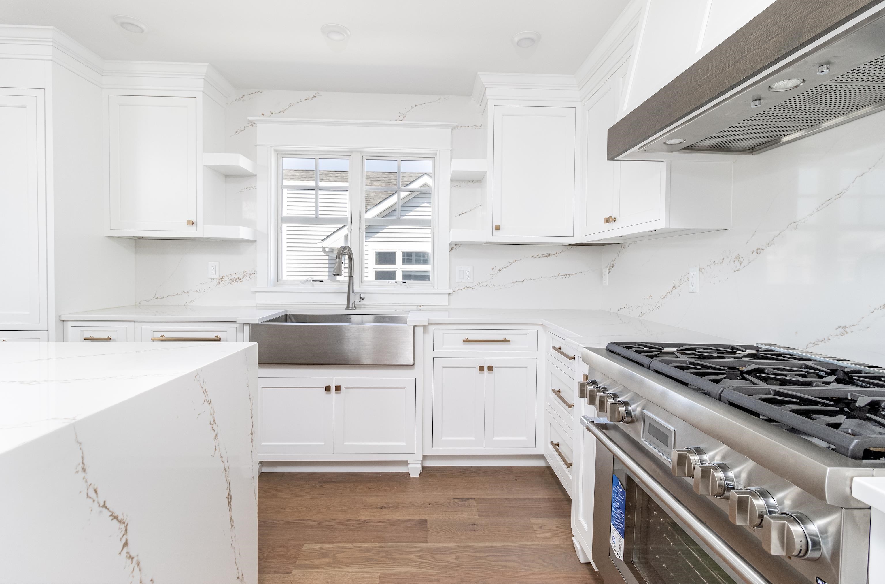 121 32nd Street Avalon, NJ 08202 - Photo 17 of 35 a kitchen with cabinets and appliances