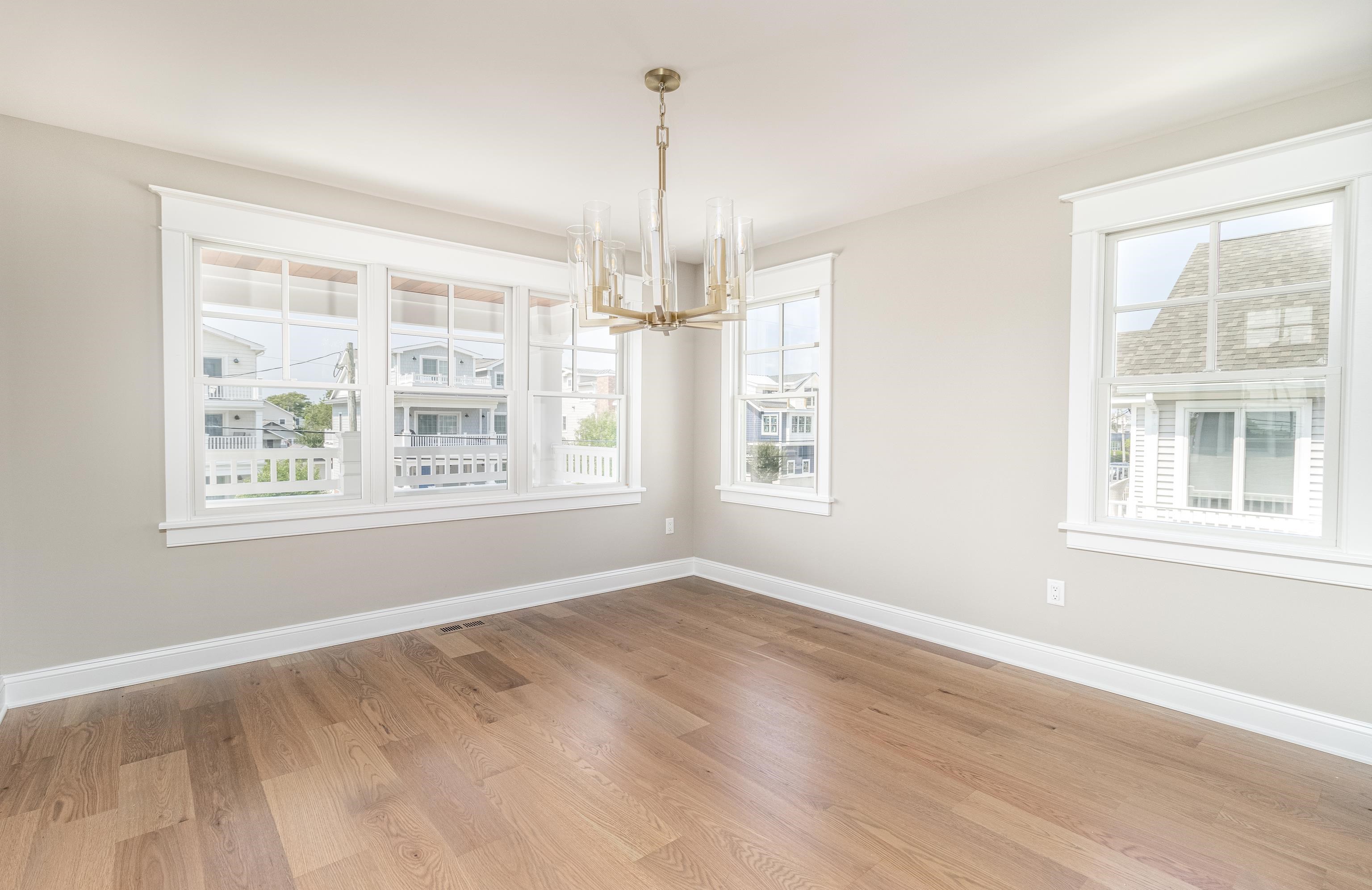 121 32nd Street Avalon, NJ 08202 - Photo 20 of 35 wooden floor in an empty room with a window