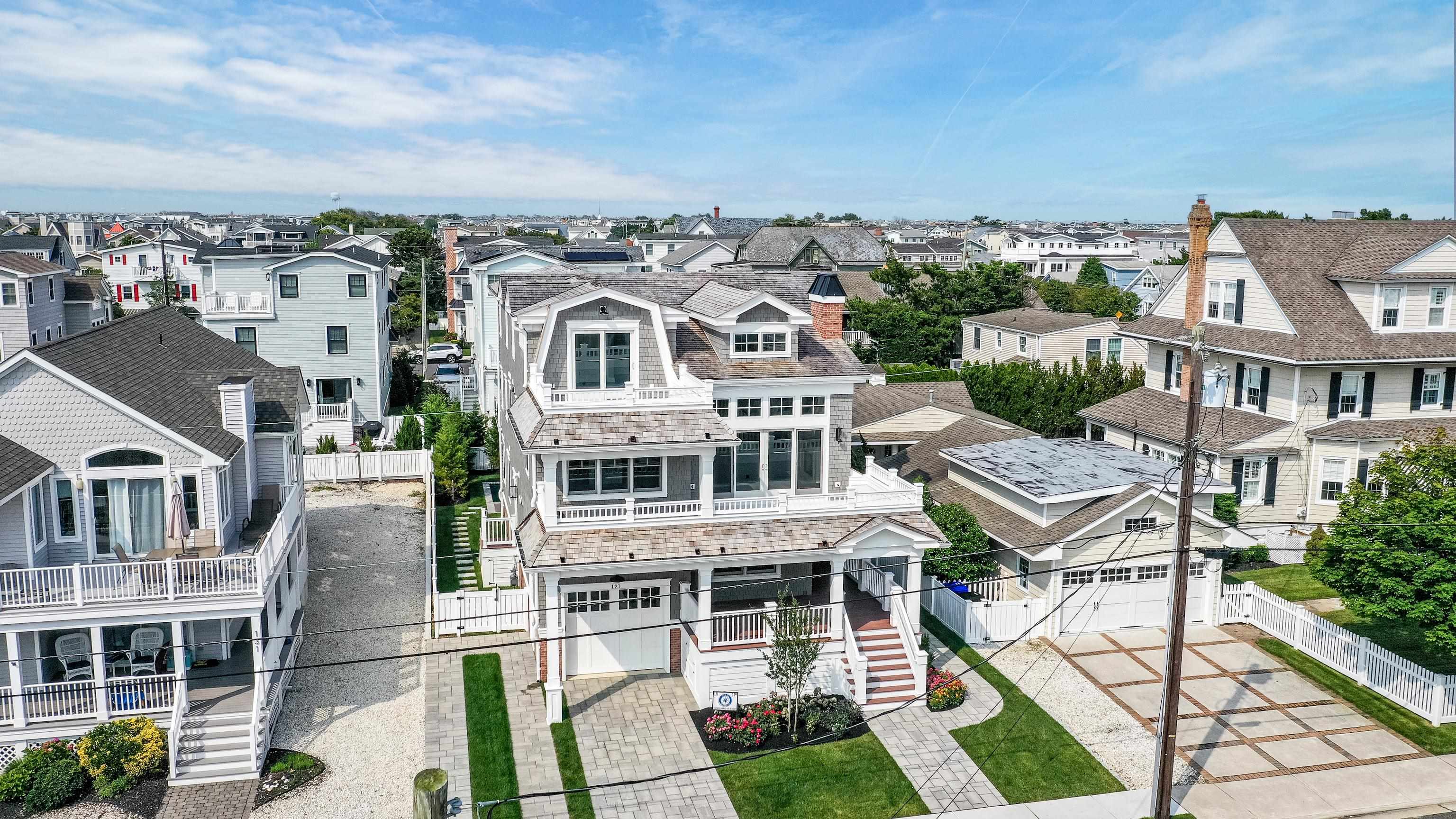 121 32nd Street Avalon, NJ 08202 - Photo 2 of 35 a view of a white building among the city view
