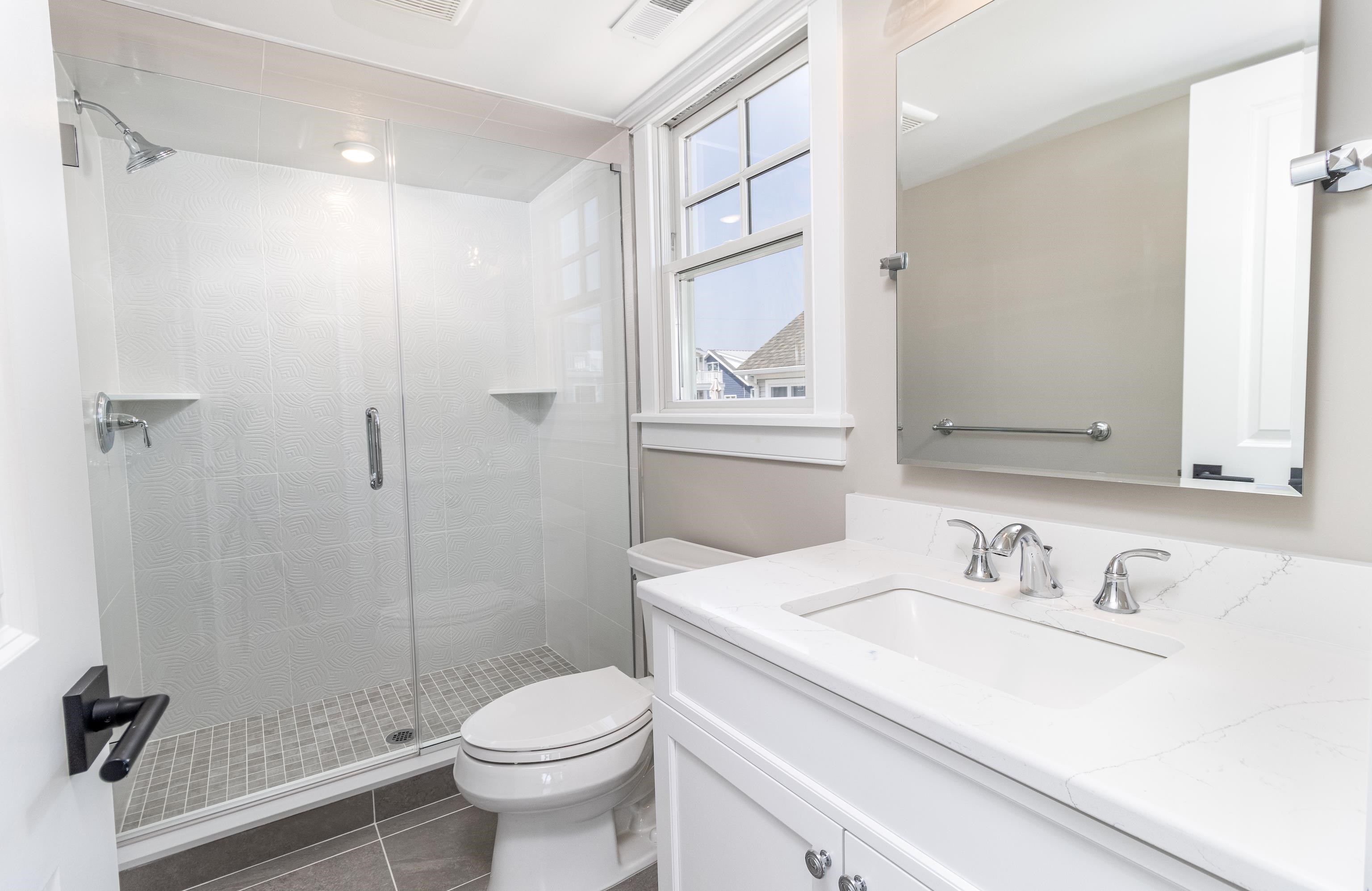 121 32nd Street Avalon, NJ 08202 - Photo 25 of 35 a bathroom with a sink toilet and shower