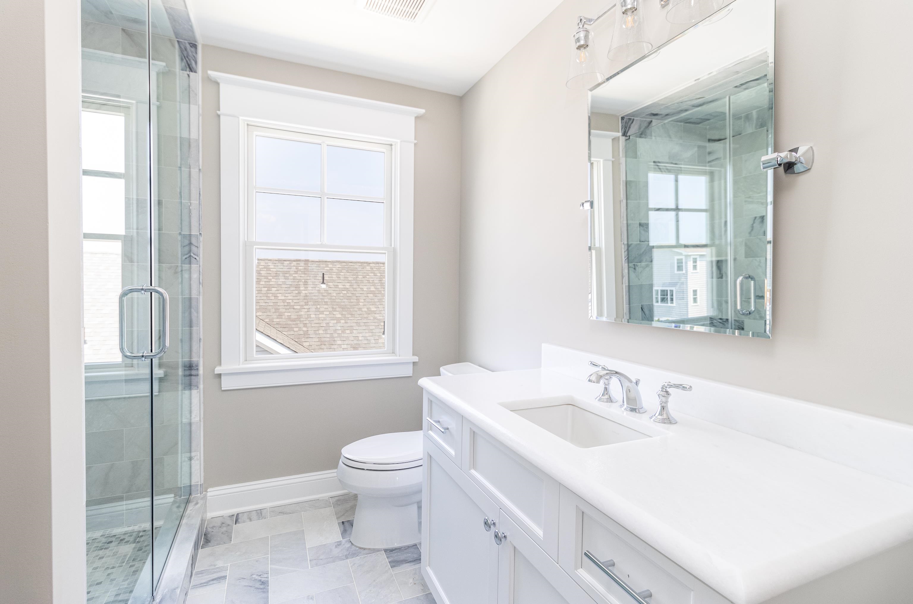 121 32nd Street Avalon, NJ 08202 - Photo 27 of 35 a bathroom with a sink toilet and shower