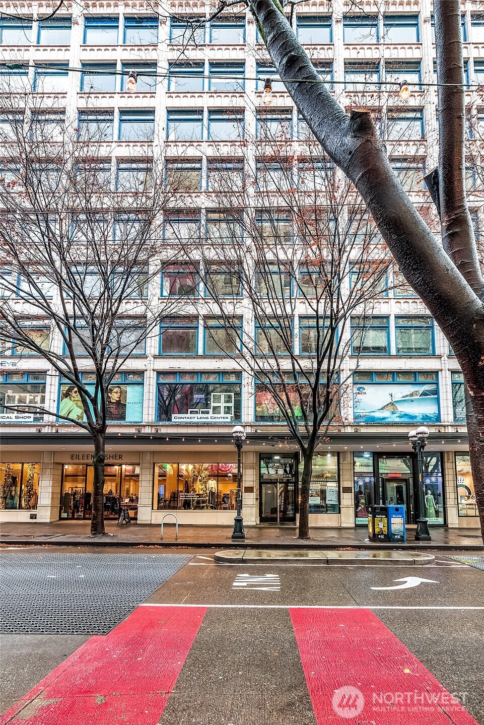 523 Pine Street, Unit 1005 Seattle, WA 98101 - Photo 1 of 10 front view of a building with a street