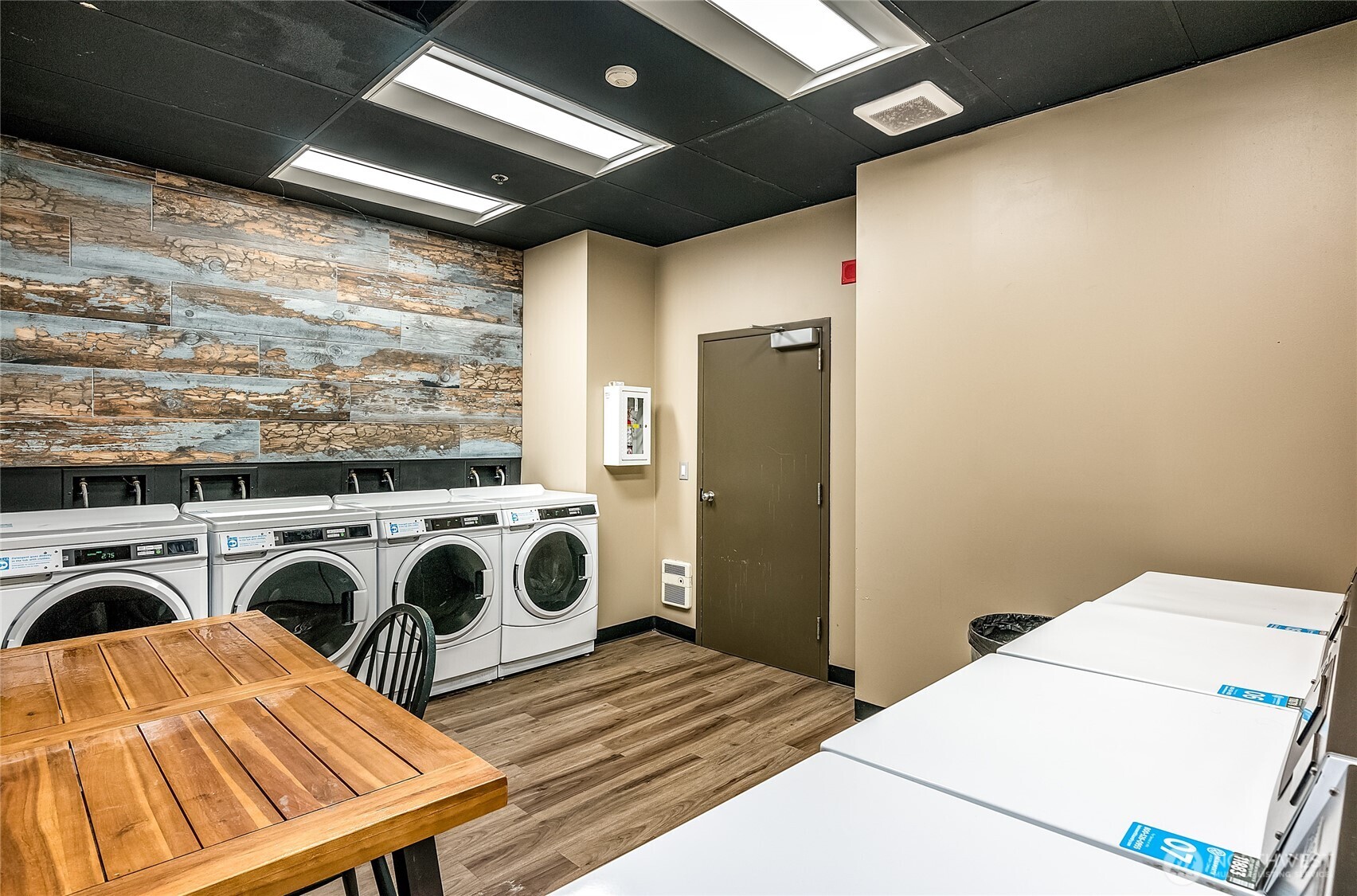 523 Pine Street, Unit 1005 Seattle, WA 98101 - Photo 10 of 10 a view of a storage & utility room with washer and dryer