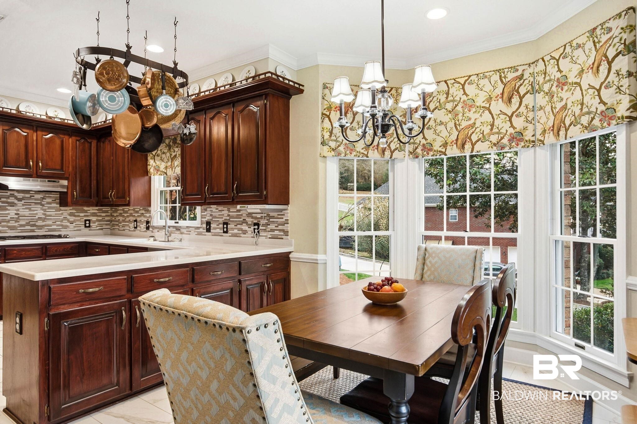 31515 Rhett Drive Spanish Fort, AL 36527 - Photo 20 of 100 This beautiful kitchen has plenty of prep space, corian countertops, a gas cooktop and stainless steel appliances. (Fridge and DW are brand new). The prep space measures 12' x 10' 6" and the eating area has a bay window and measures 13' 6" x 11' 8".