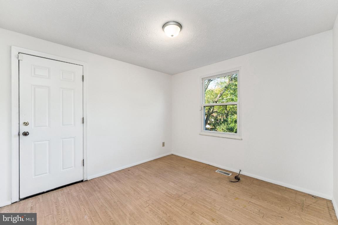 8106 Triple Crown Road Bowie, MD 20715 - Photo 12 of 26 an empty room with windows