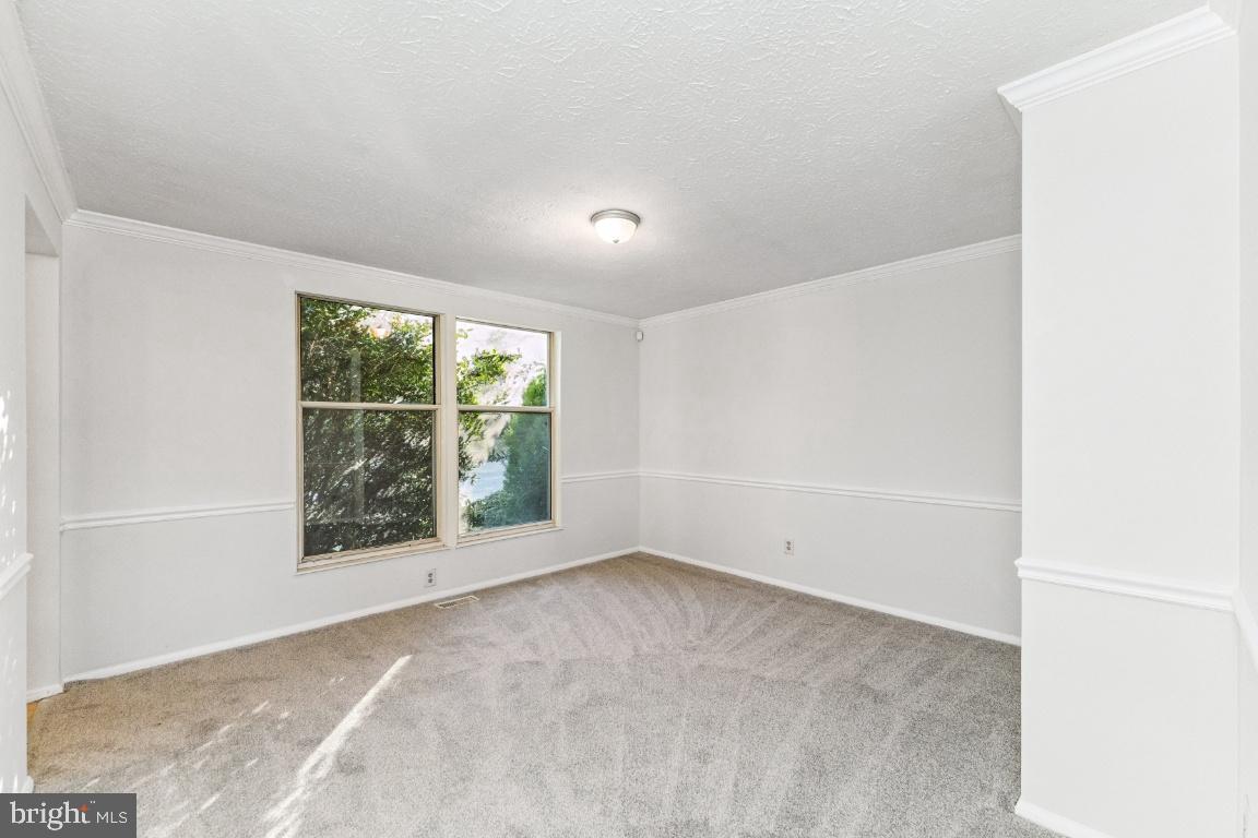 8106 Triple Crown Road Bowie, MD 20715 - Photo 13 of 26 an empty room with windows