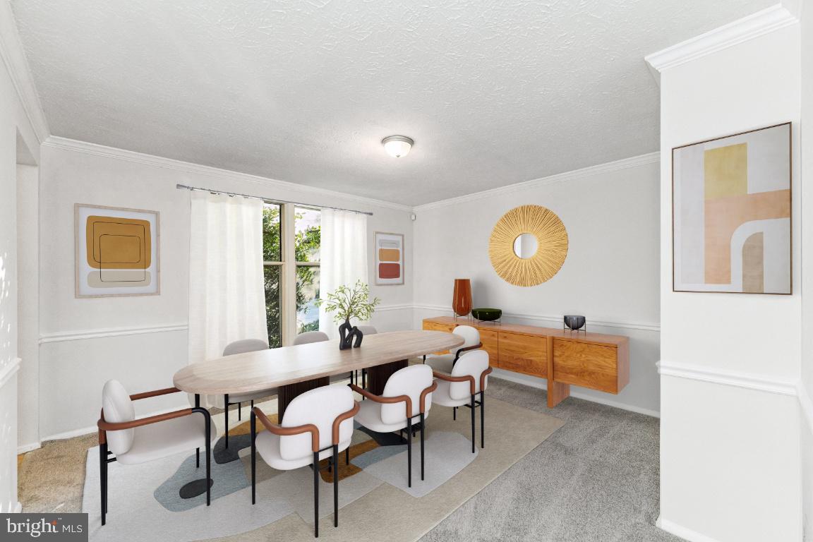 8106 Triple Crown Road Bowie, MD 20715 - Photo 14 of 26 a dining room with wooden floor and a chandelier