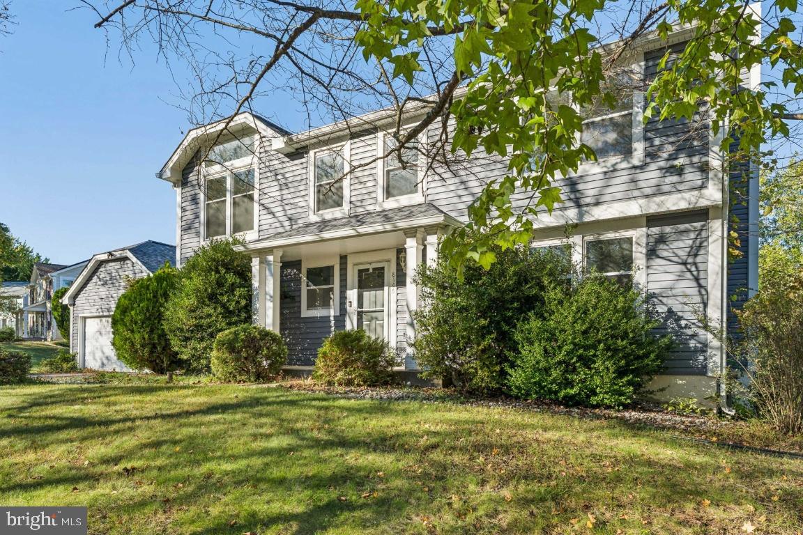 8106 Triple Crown Road Bowie, MD 20715 - Photo 2 of 26 a view of a house with a garden