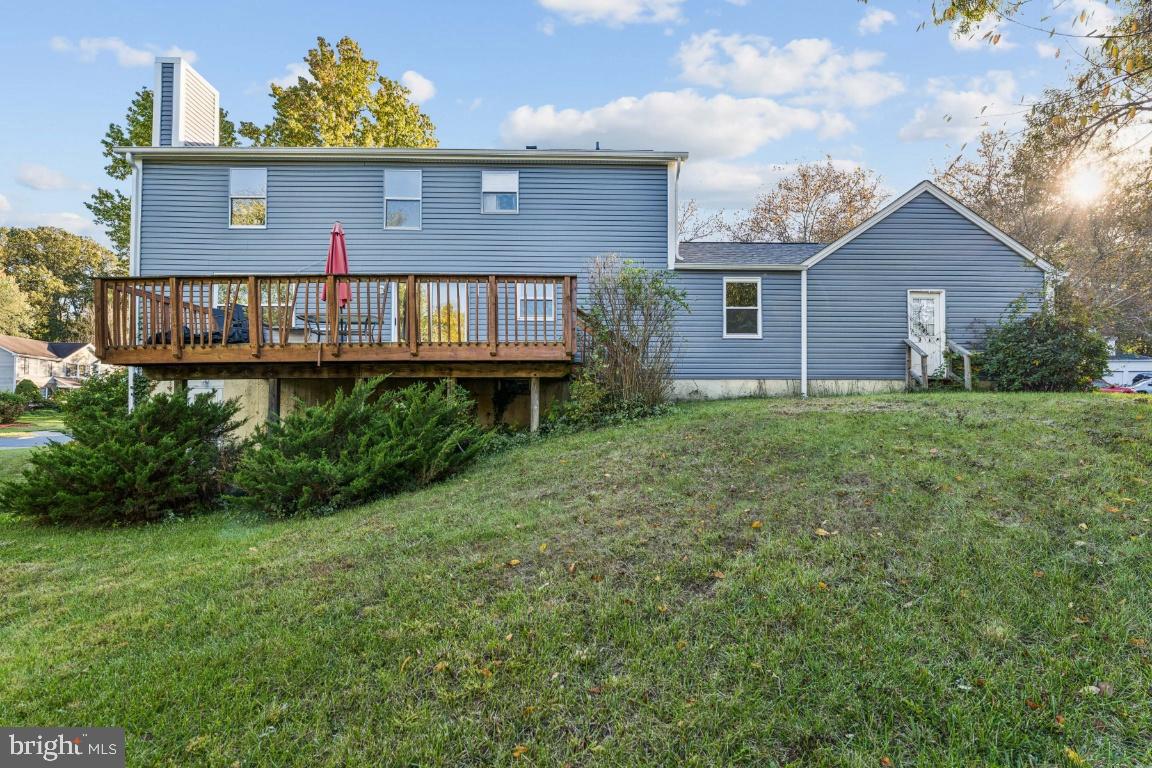 8106 Triple Crown Road Bowie, MD 20715 - Photo 25 of 26 a view of a house with a yard