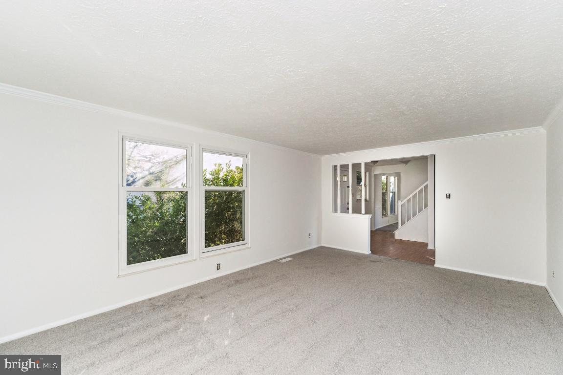 8106 Triple Crown Road Bowie, MD 20715 - Photo 4 of 26 an empty room with windows