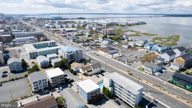 an aerial view of a city with lots of residential buildings