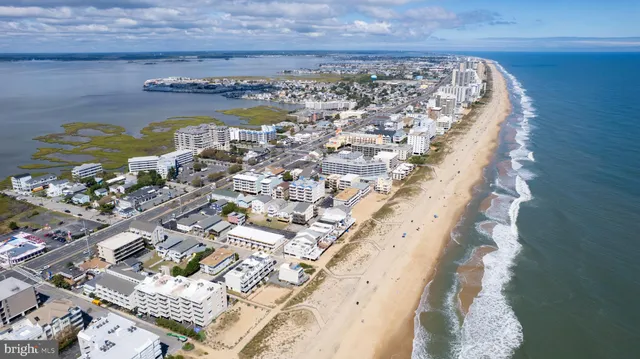 a view of water heater and living room