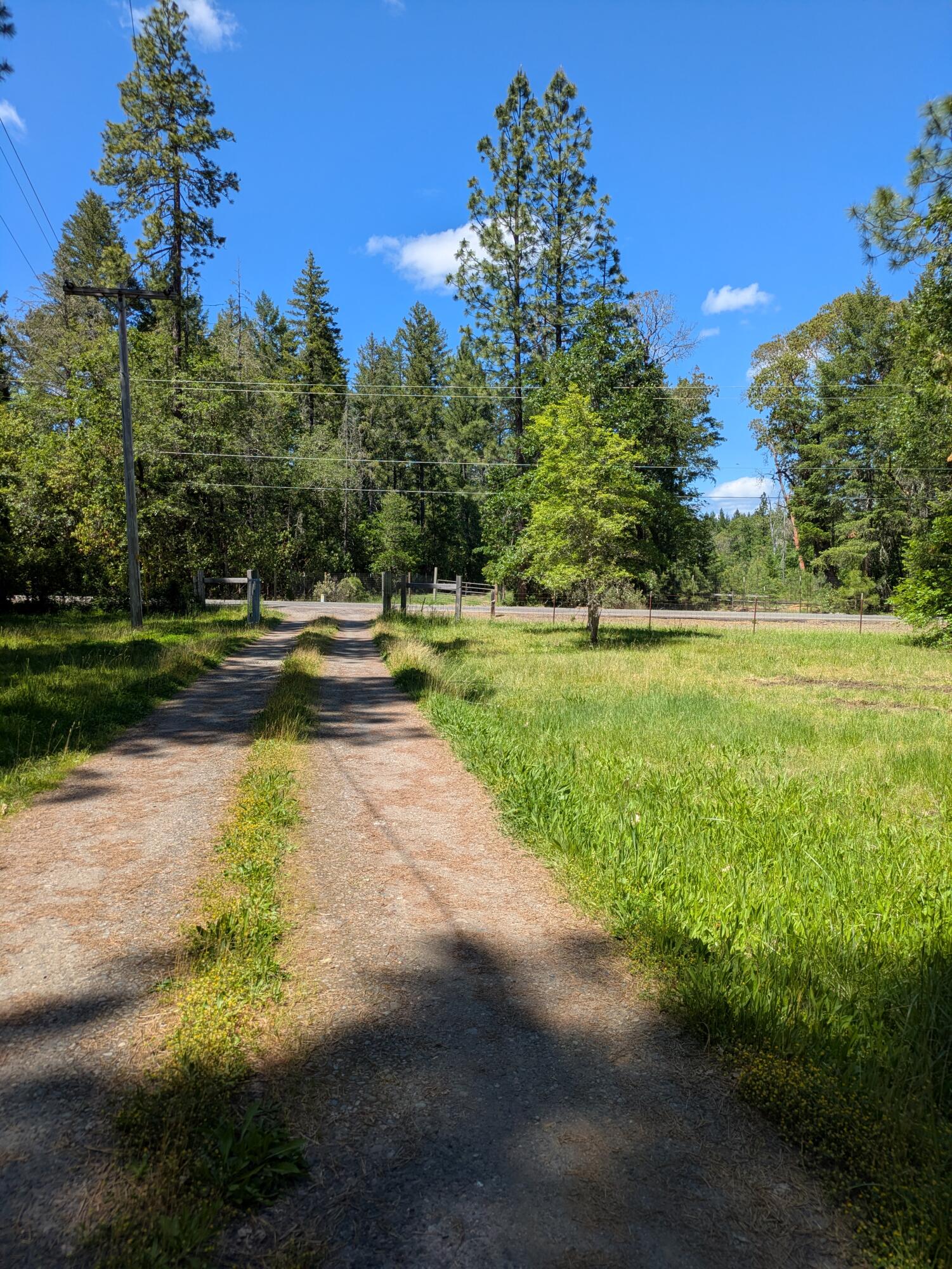 575 Kirkham Road Cave Junction, OR 97523 - Photo 2 of 45 a view of a lake view with a big yard
