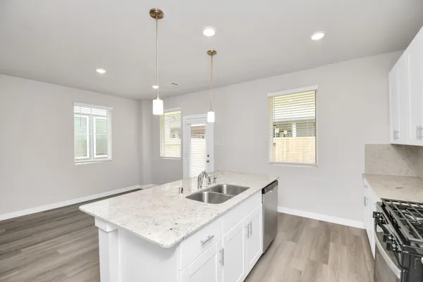 a bathroom with a sink a vanity and a mirror