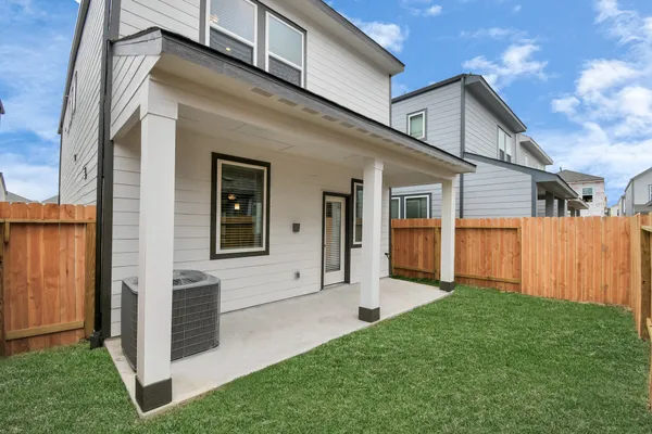 a view of front door and yard