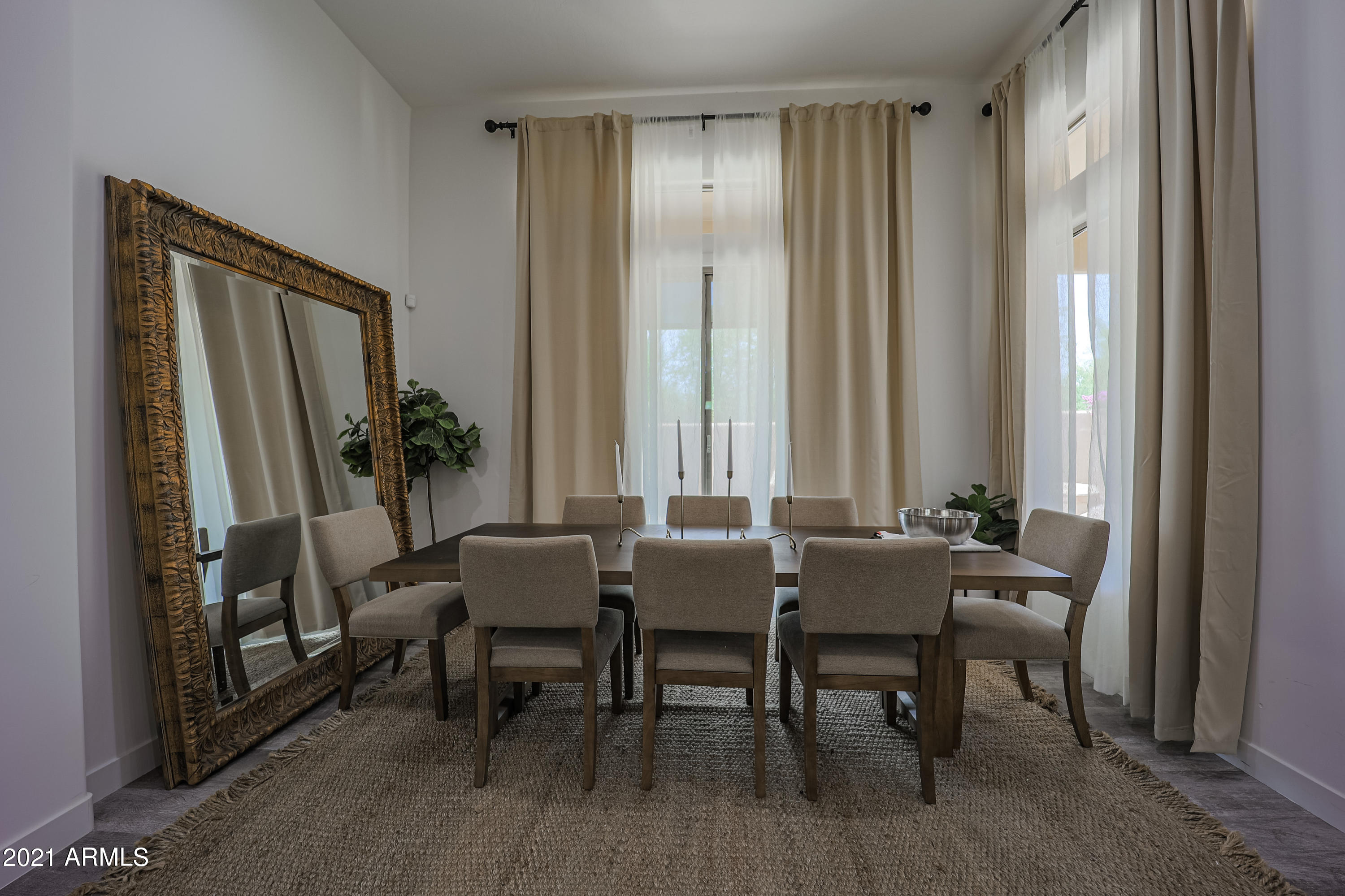 8136 East Beardsley Road Scottsdale, AZ 85255 - Photo 11 of 38 a dining room with furniture and window