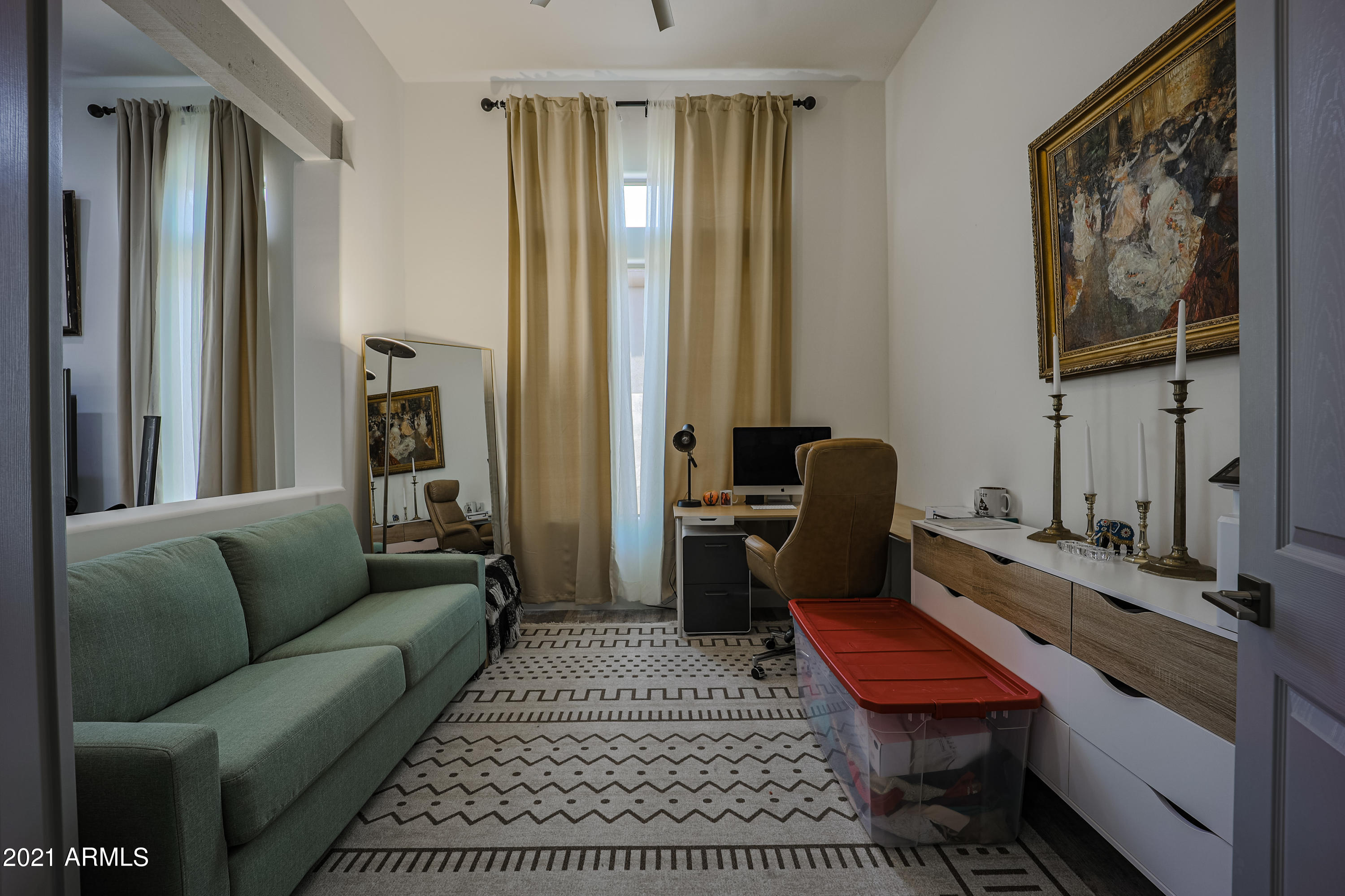 8136 East Beardsley Road Scottsdale, AZ 85255 - Photo 13 of 38 a living room with furniture a rug and a window