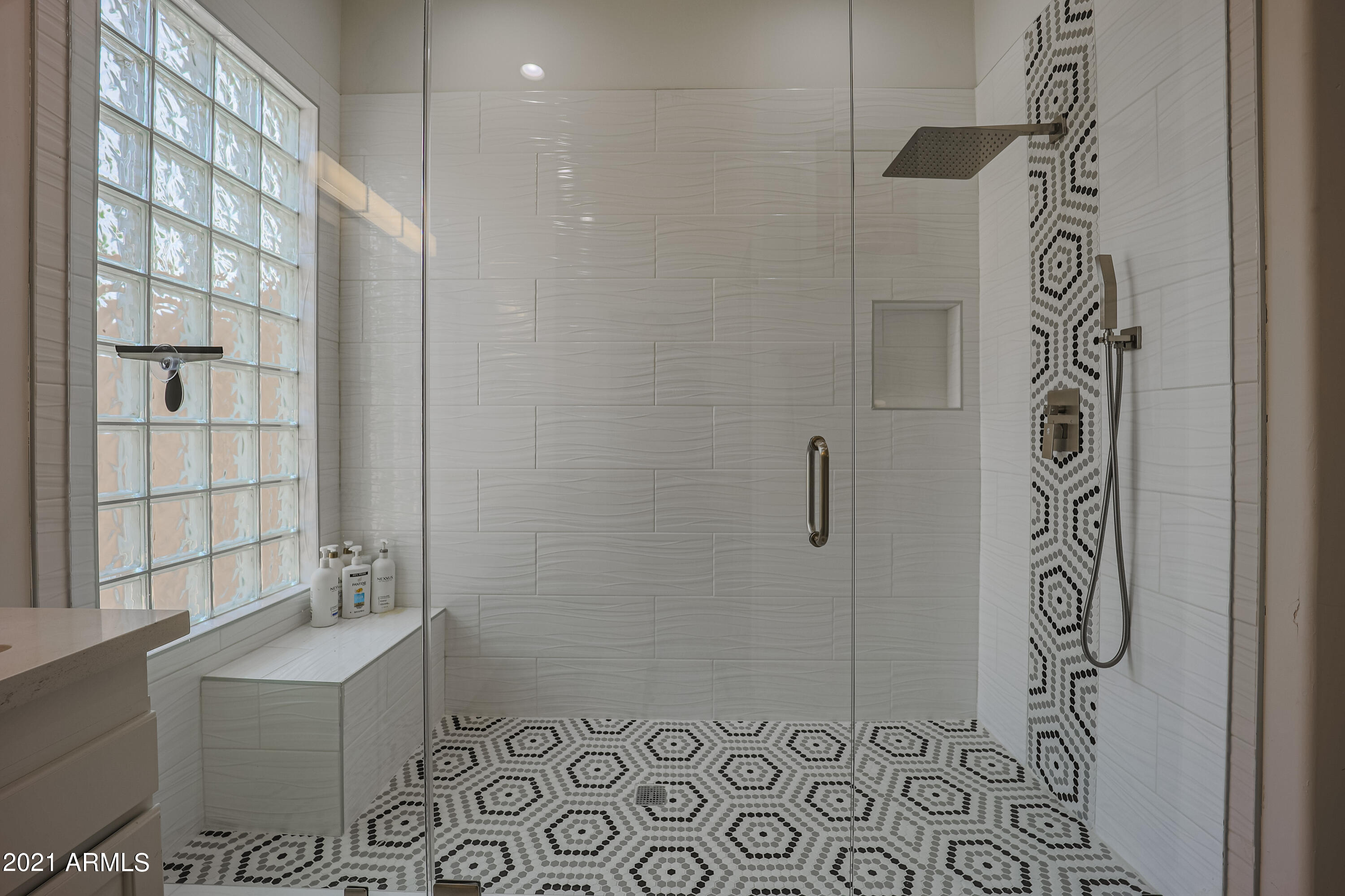 8136 East Beardsley Road Scottsdale, AZ 85255 - Photo 24 of 38 a bathroom with a shower and a sink
