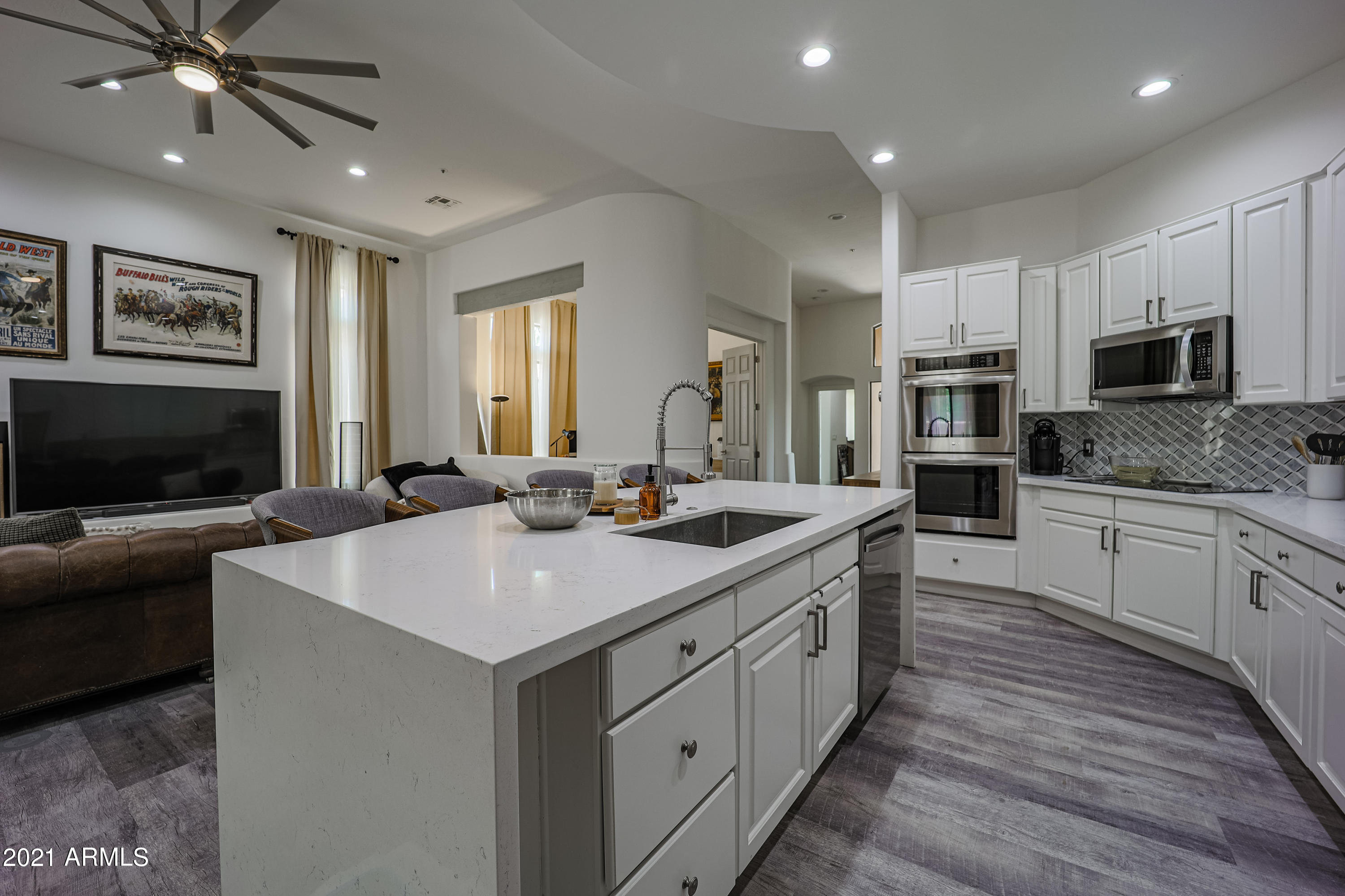 8136 East Beardsley Road Scottsdale, AZ 85255 - Photo 7 of 38 a kitchen with sink stove and refrigerator