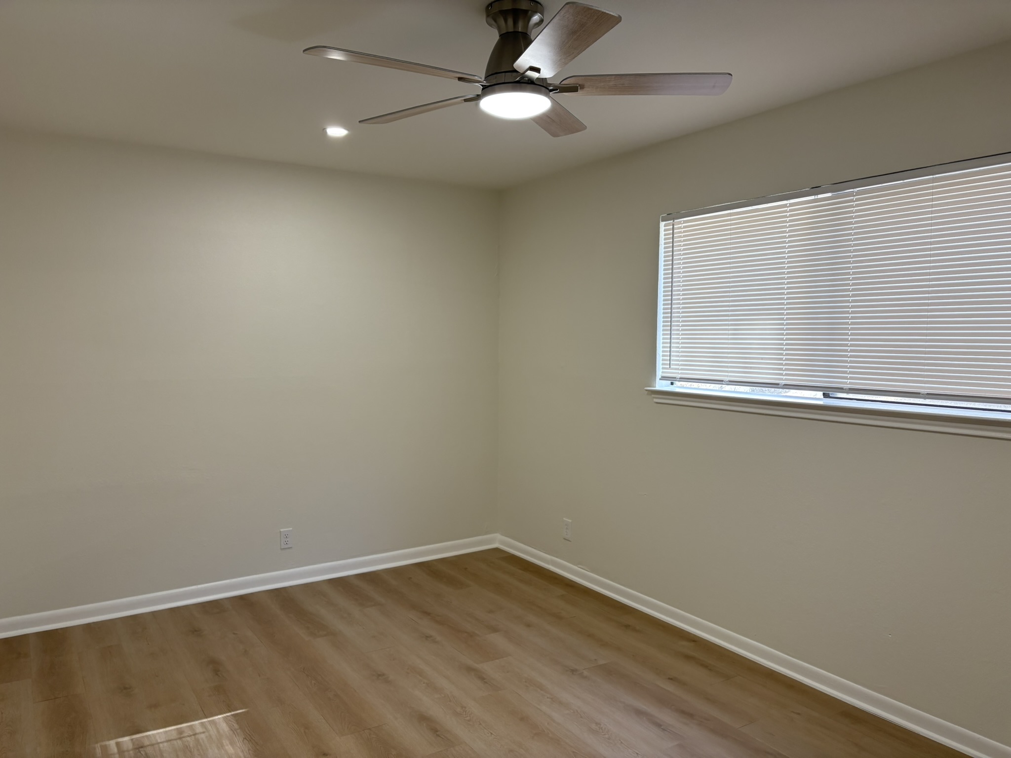 6009 Shadow Valley Cove, Unit A Austin, TX 78731 - Photo 16 of 24 Spare room featuring light wood finished floors, ceiling fan, and recessed lighting