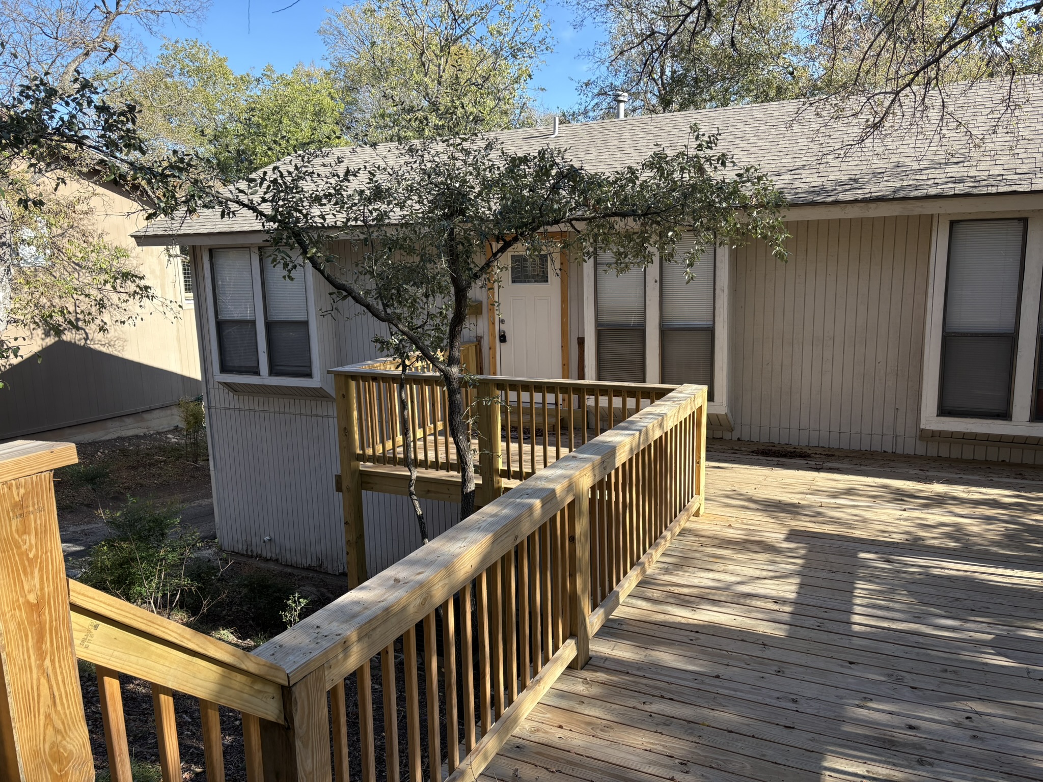 6009 Shadow Valley Cove, Unit A Austin, TX 78731 - Photo 2 of 24 View of wooden deck