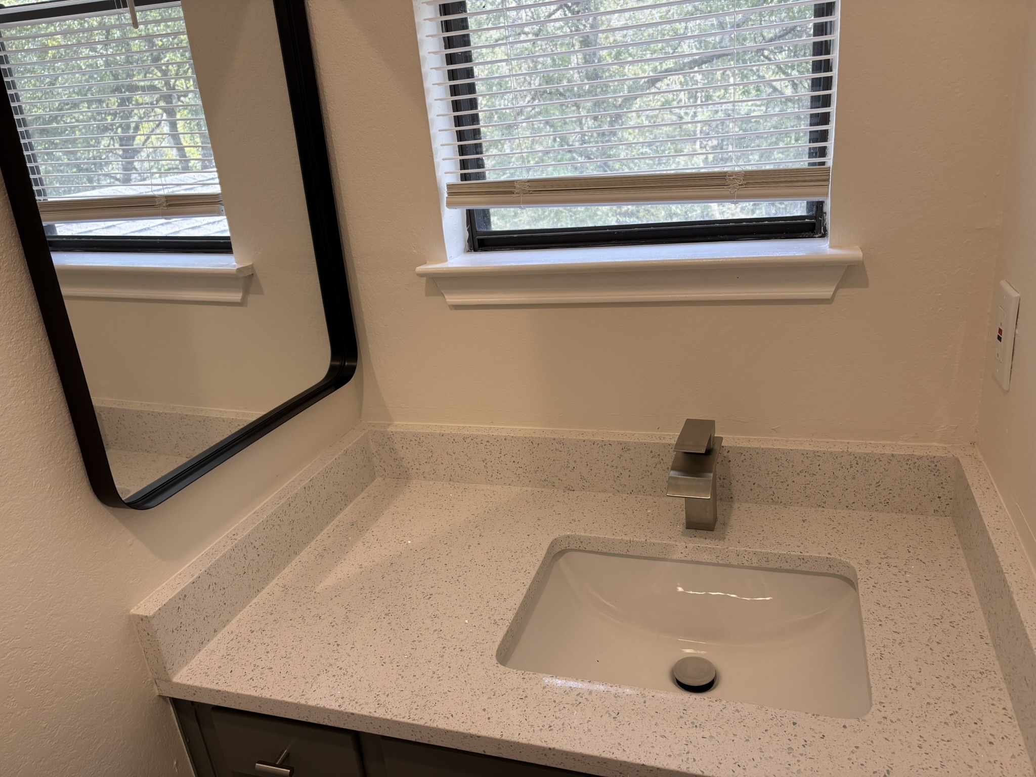 6009 Shadow Valley Cove, Unit A Austin, TX 78731 - Photo 23 of 24 Bathroom featuring vanity and healthy amount of natural light