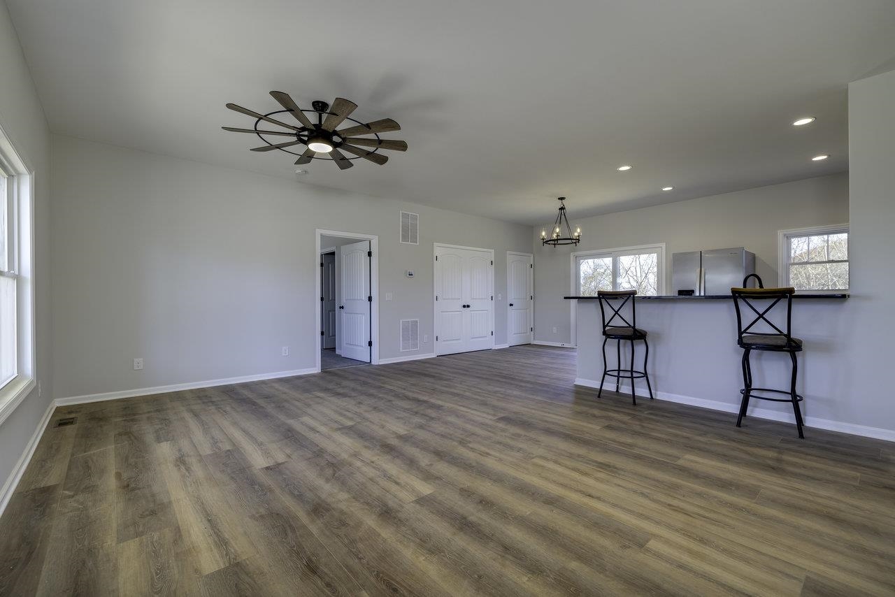 105 Springridge Lane Fairfield, VA 24435 - Photo 22 of 54 a view of a livingroom with furniture and a ceiling fan