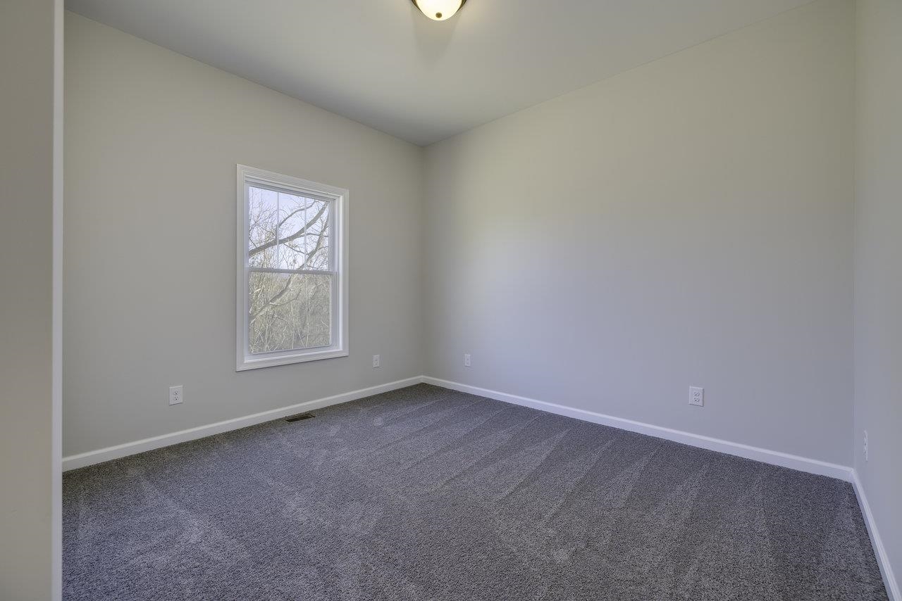 105 Springridge Lane Fairfield, VA 24435 - Photo 31 of 54 an empty room with windows