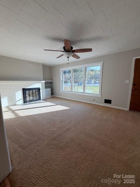 1972 Connelly Springs Road Lenoir, NC 28645 - Photo 4 of 13 a living room with furniture and a ceiling fan