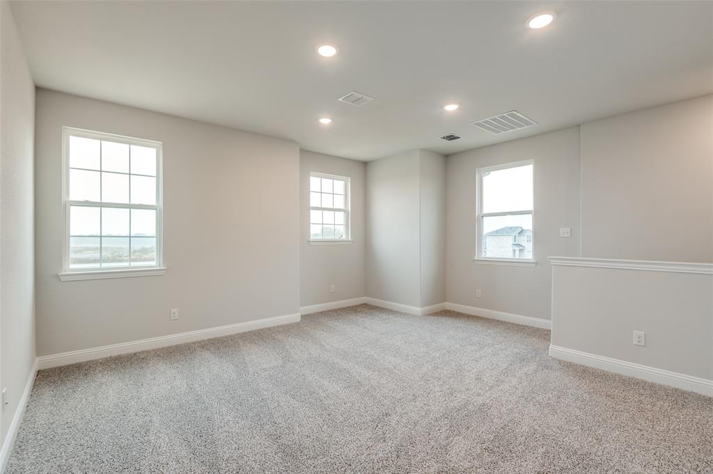 832 Santa Lucia Drive Anna, TX 75409 - Photo 12 of 33 Unfurnished room with recessed lighting, light colored carpet, and healthy amount of natural light