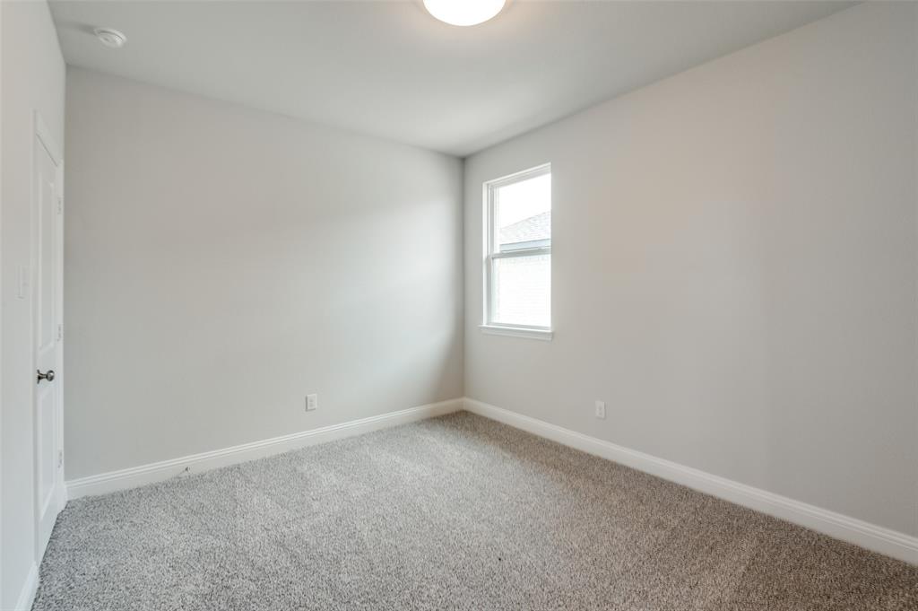 832 Santa Lucia Drive Anna, TX 75409 - Photo 14 of 33 Unfurnished room with baseboards and carpet flooring